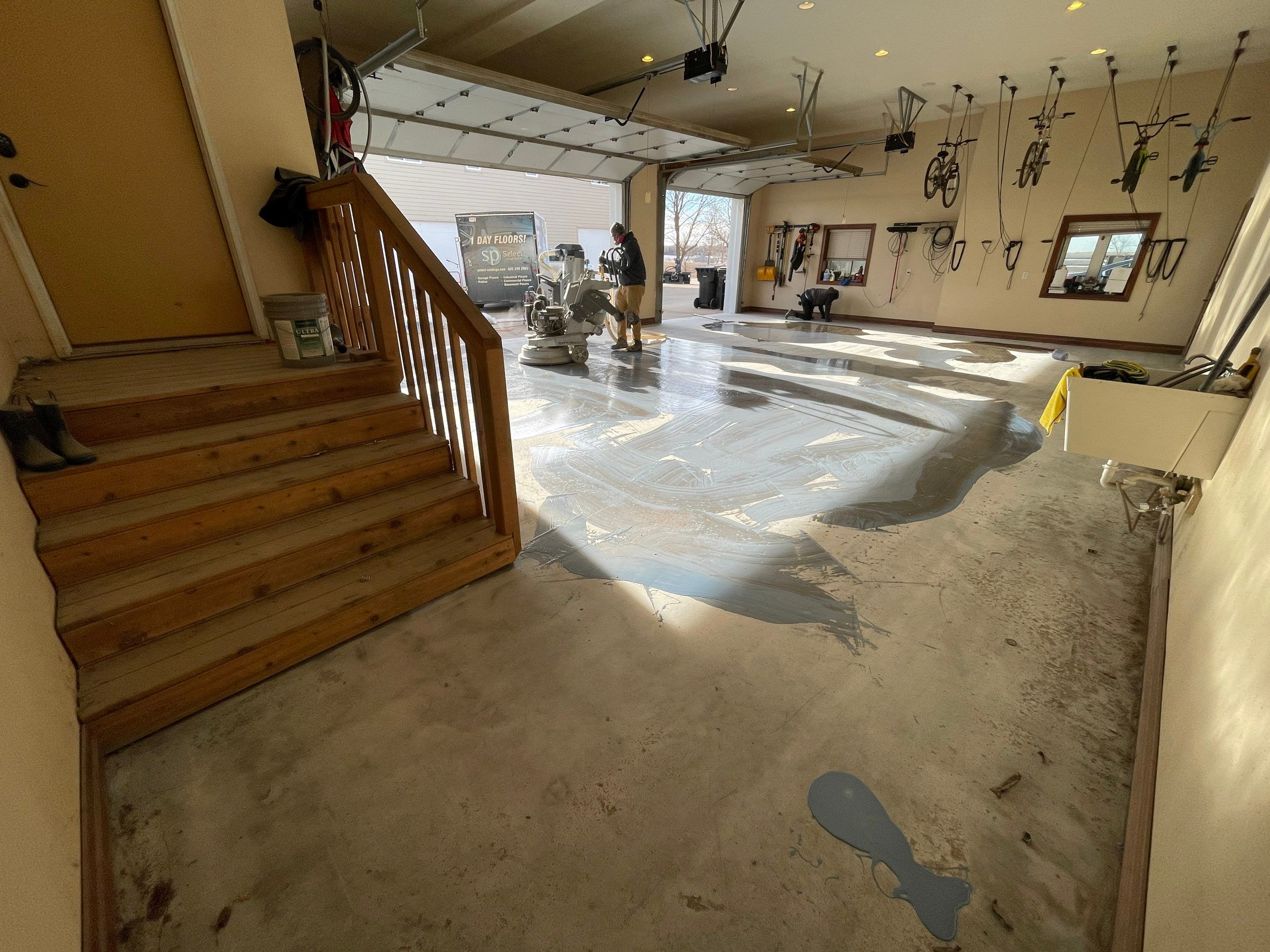 Garage using Slate Stone by Select Painting, Coatings & Garage Cabinets