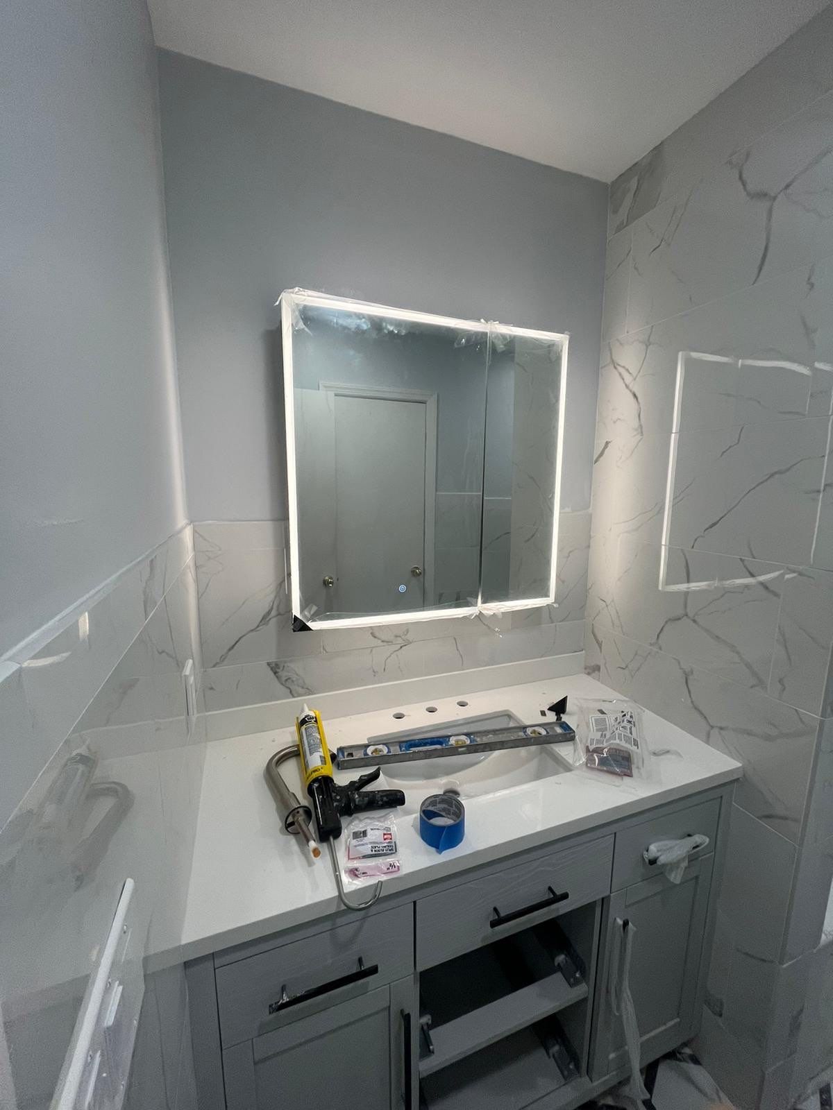 Bathroom Remodel using Tile by Home Concepts Construction