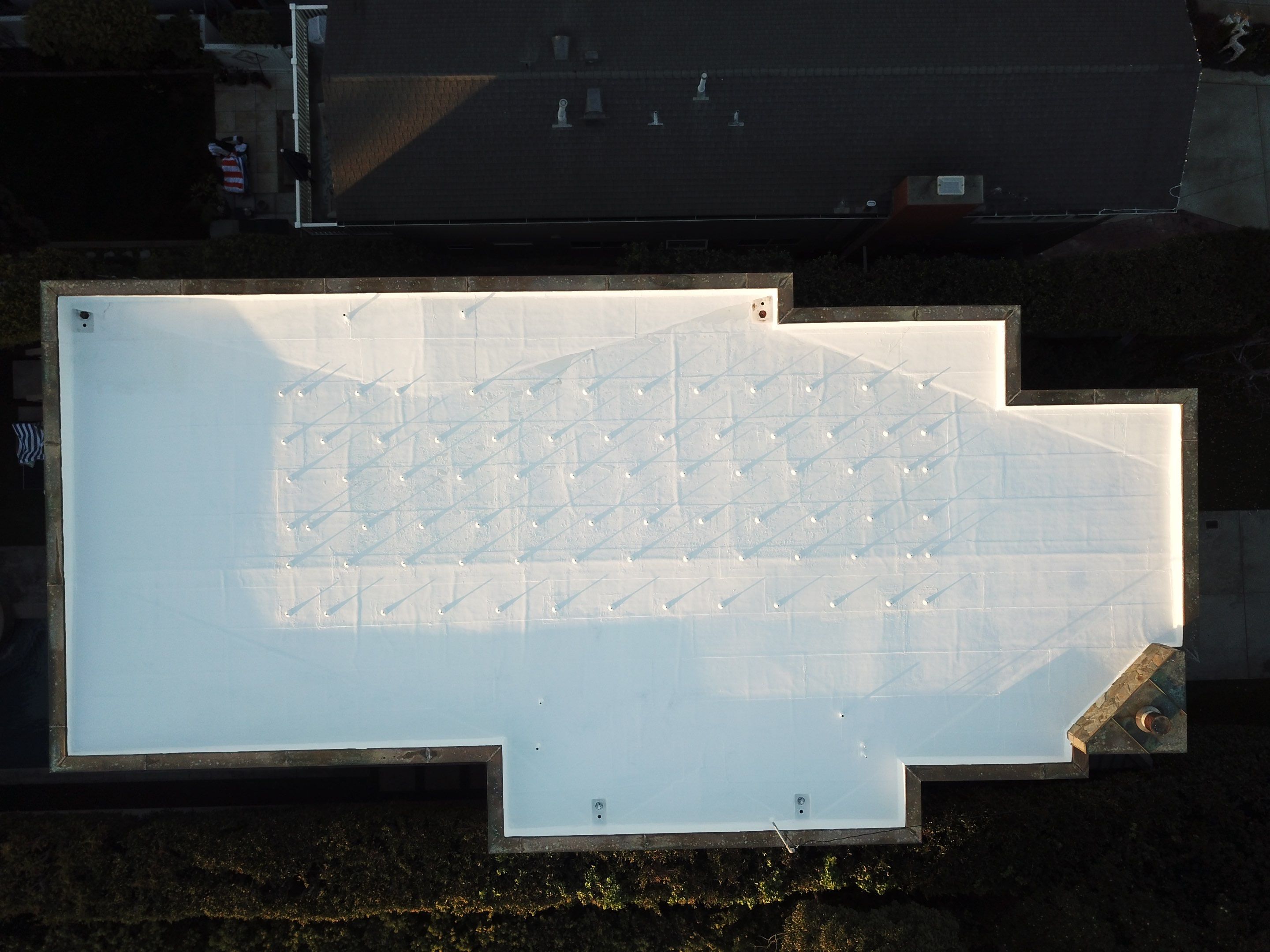 Residential Roofing Installation using ASC Silicone Membrane by Hull Brothers Roofing