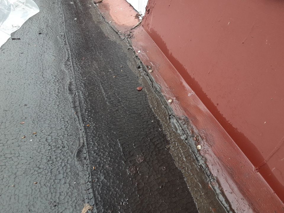 Residential Roof Replacement using Patio Roof by Absolute Roofing and Construction