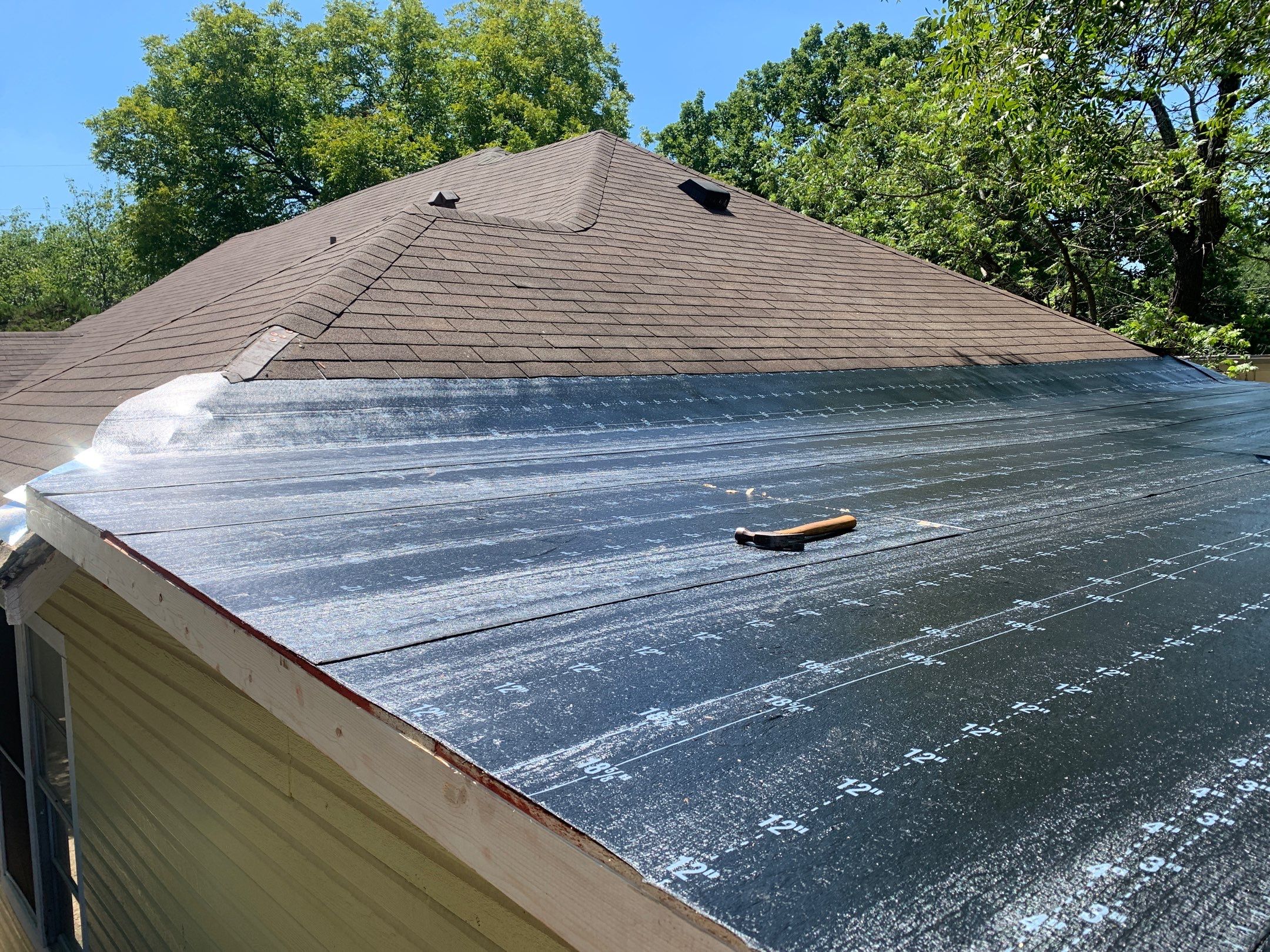 Residential Roofing Installation using Modified Bitumen Roll Roofing by Harvey Roofing & Construction
