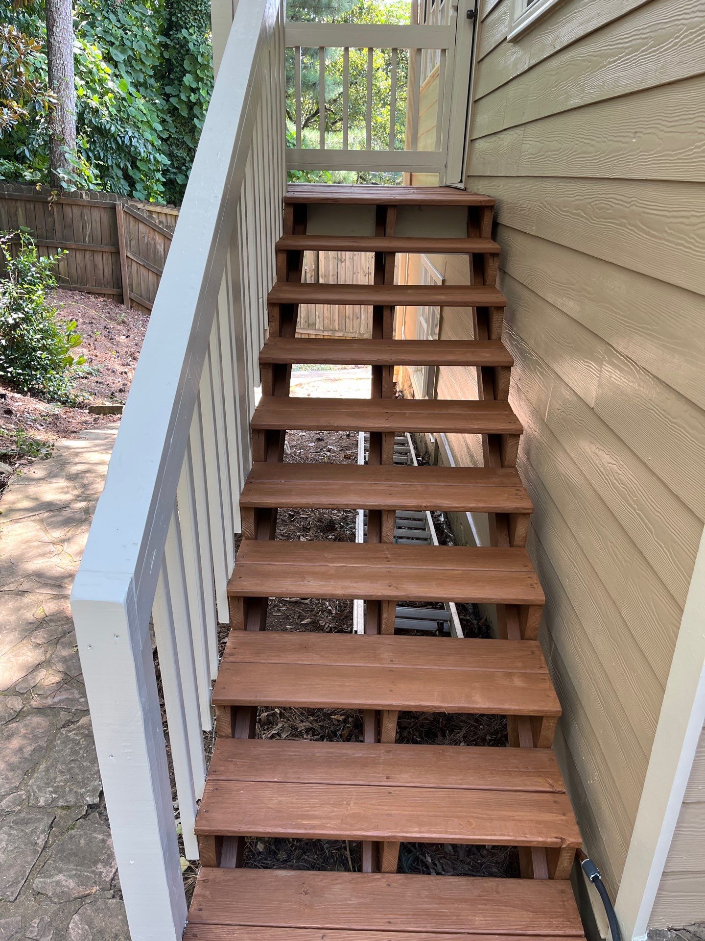 Rotted Wood Replacement, Deck Stain, and Exterior Paint Project in Kennesaw, GA by Nelson Exteriors 