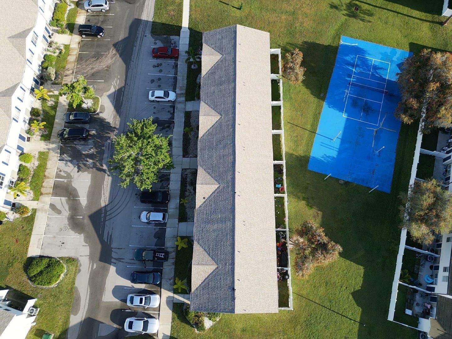 Apartment Complex Shingle Roof Replacement by Sailfish Roofing
