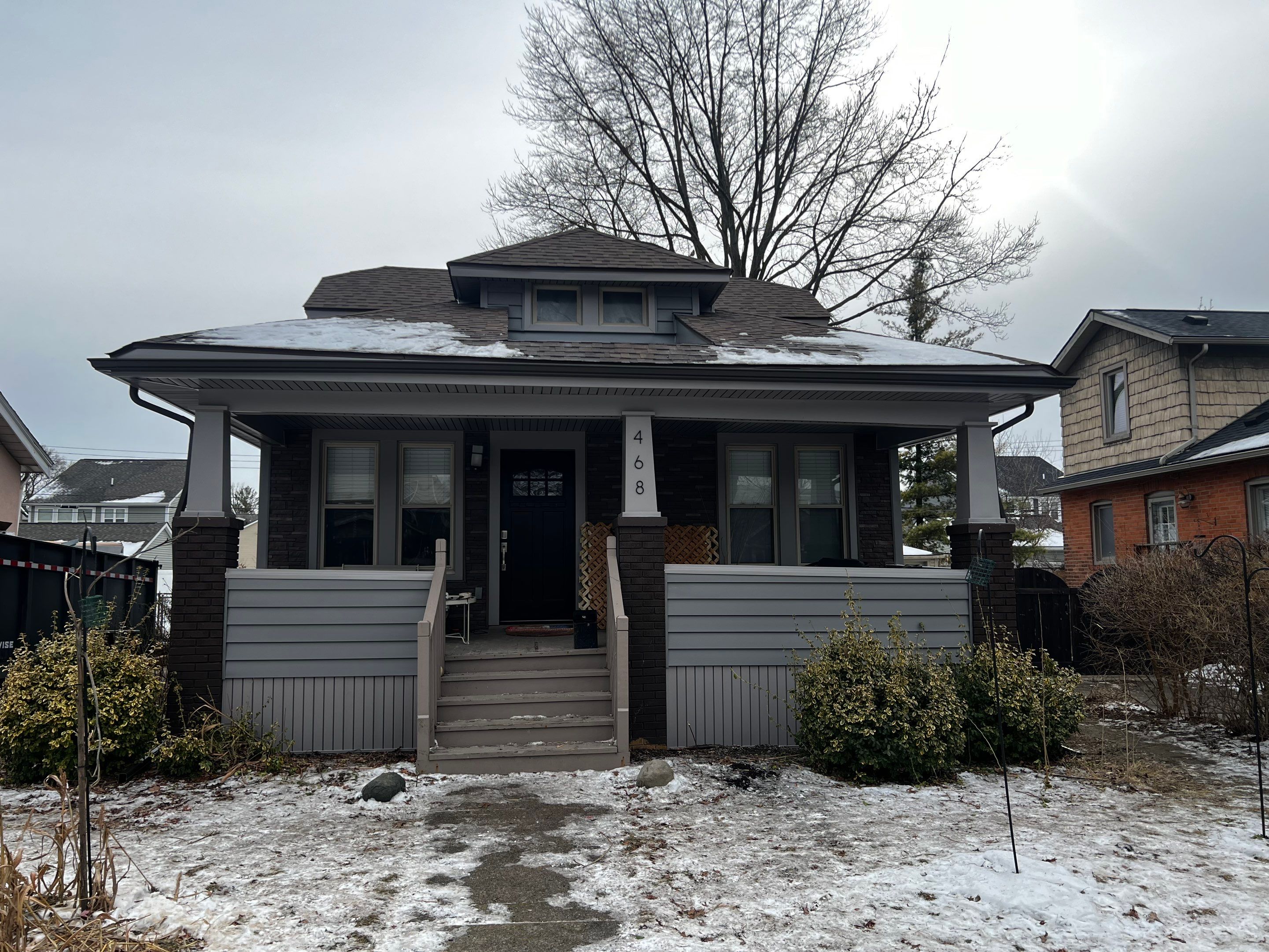 Vinyl Siding Replacement by Bloomfield Construction & Restoration