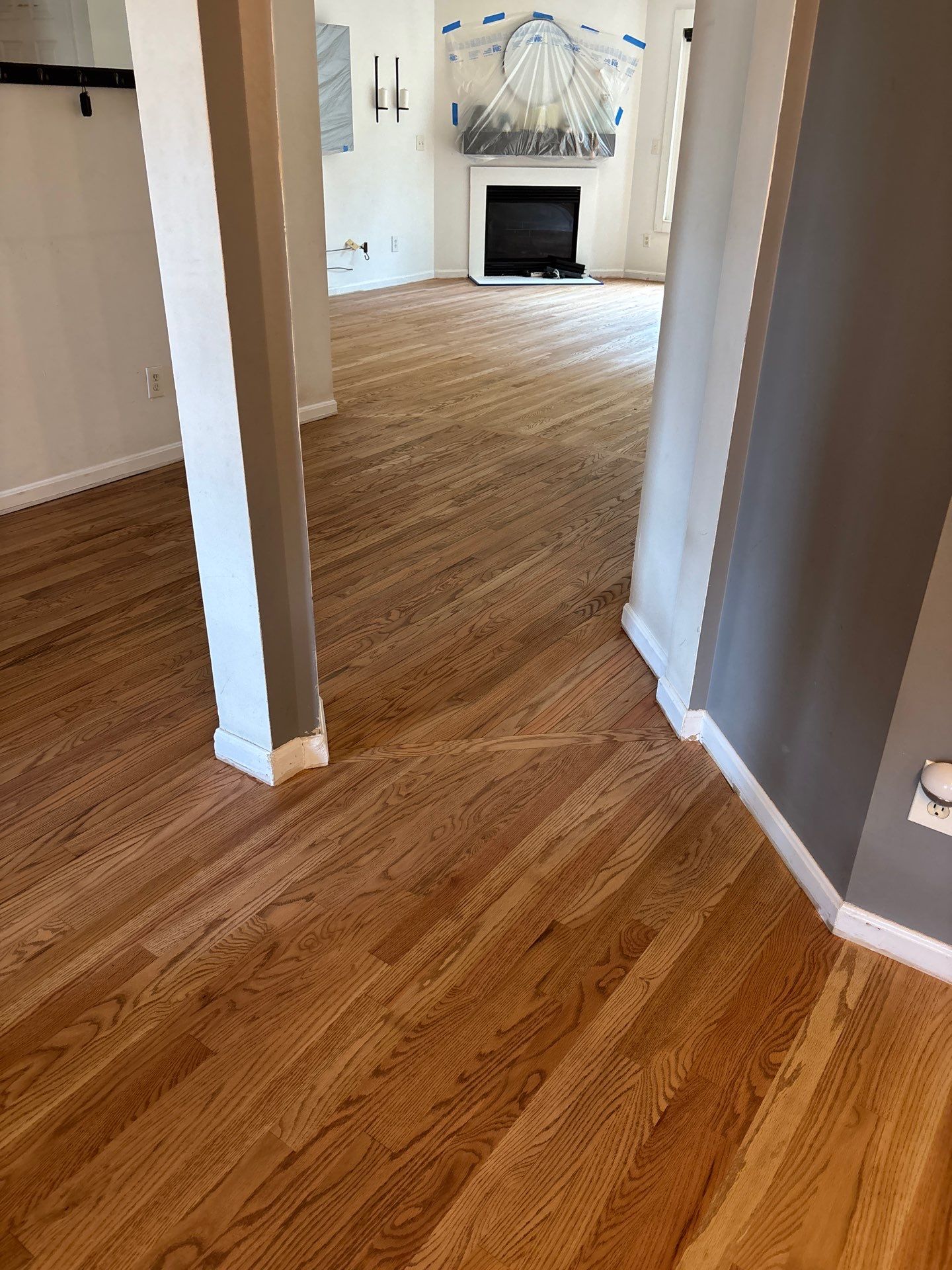Natural Oak Hardwood Installation and Refinishing in Florence, Kentucky by Footprints Floors Kentucky