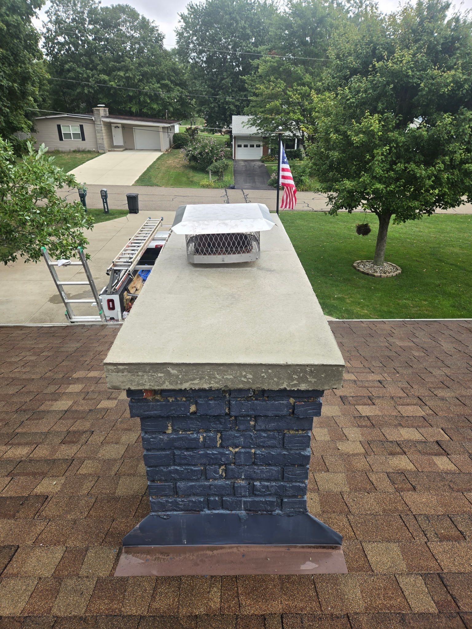 Roof Replacment, Chimney crown  by Know-A-Guy Roofing & Exteriors 
