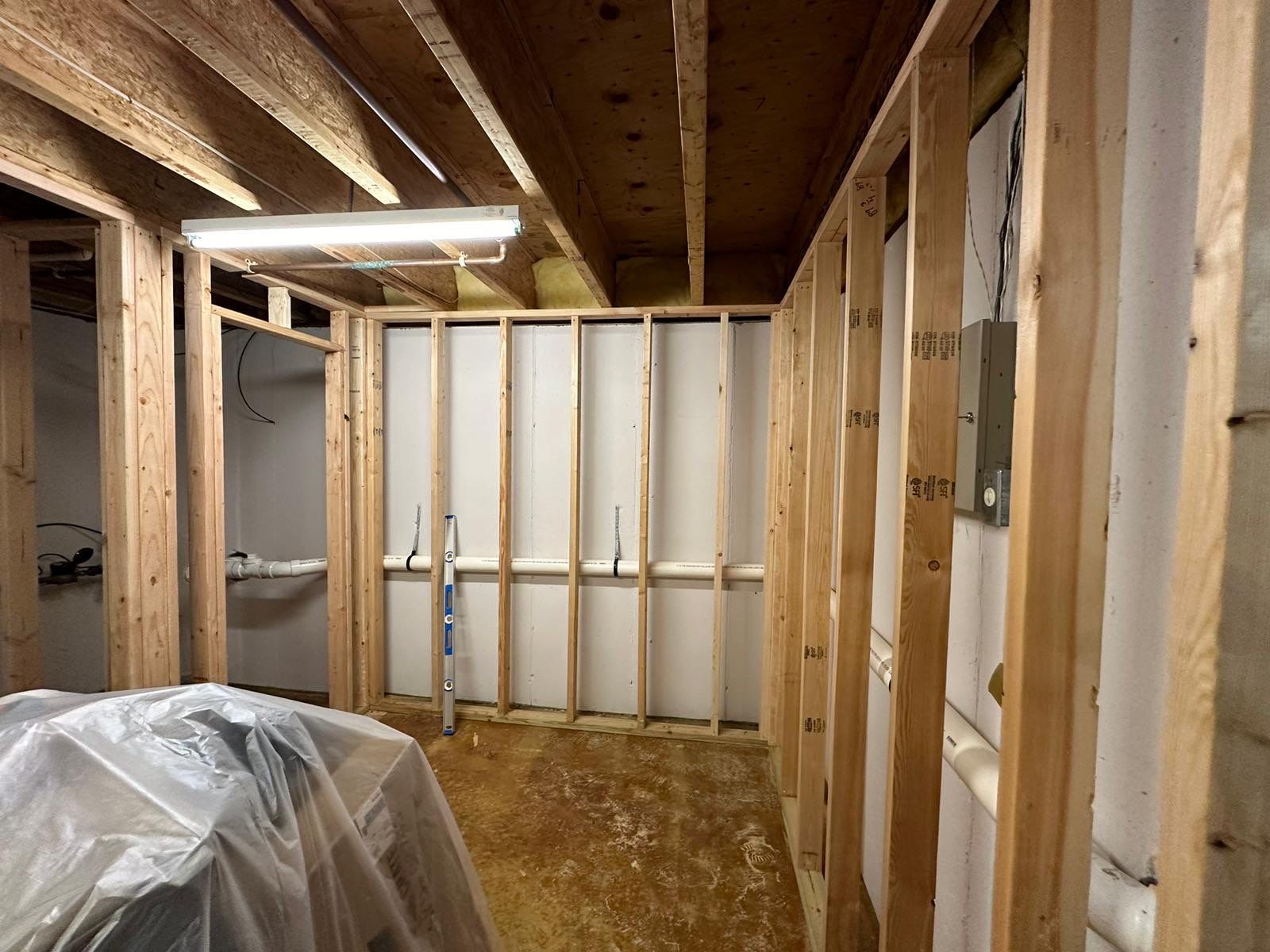 Basement Remodel using Wood by Home Concepts Construction