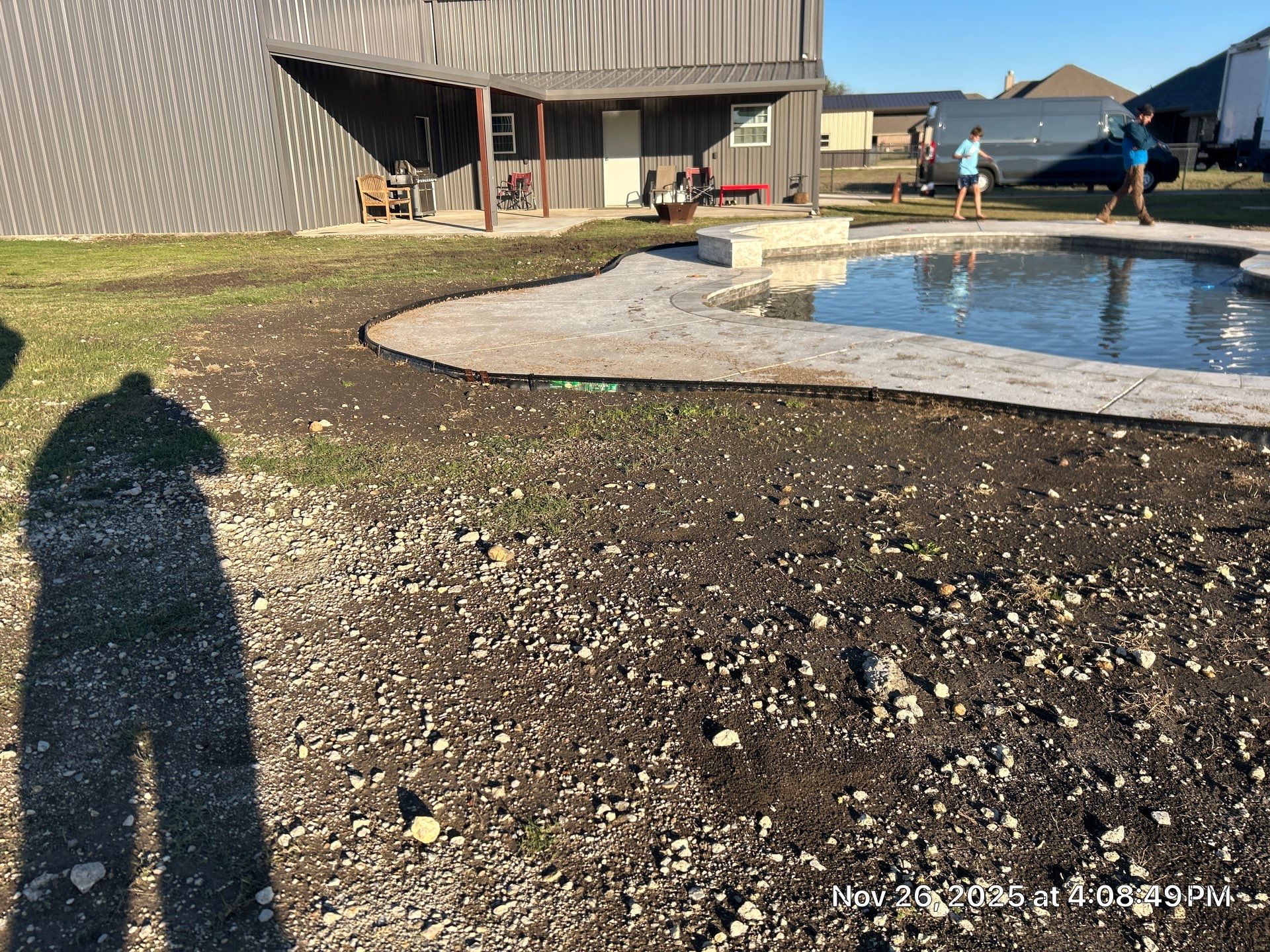 Freeform Pool with Expansive Concrete Deck by Pinnacle Pools and Spas - DFW