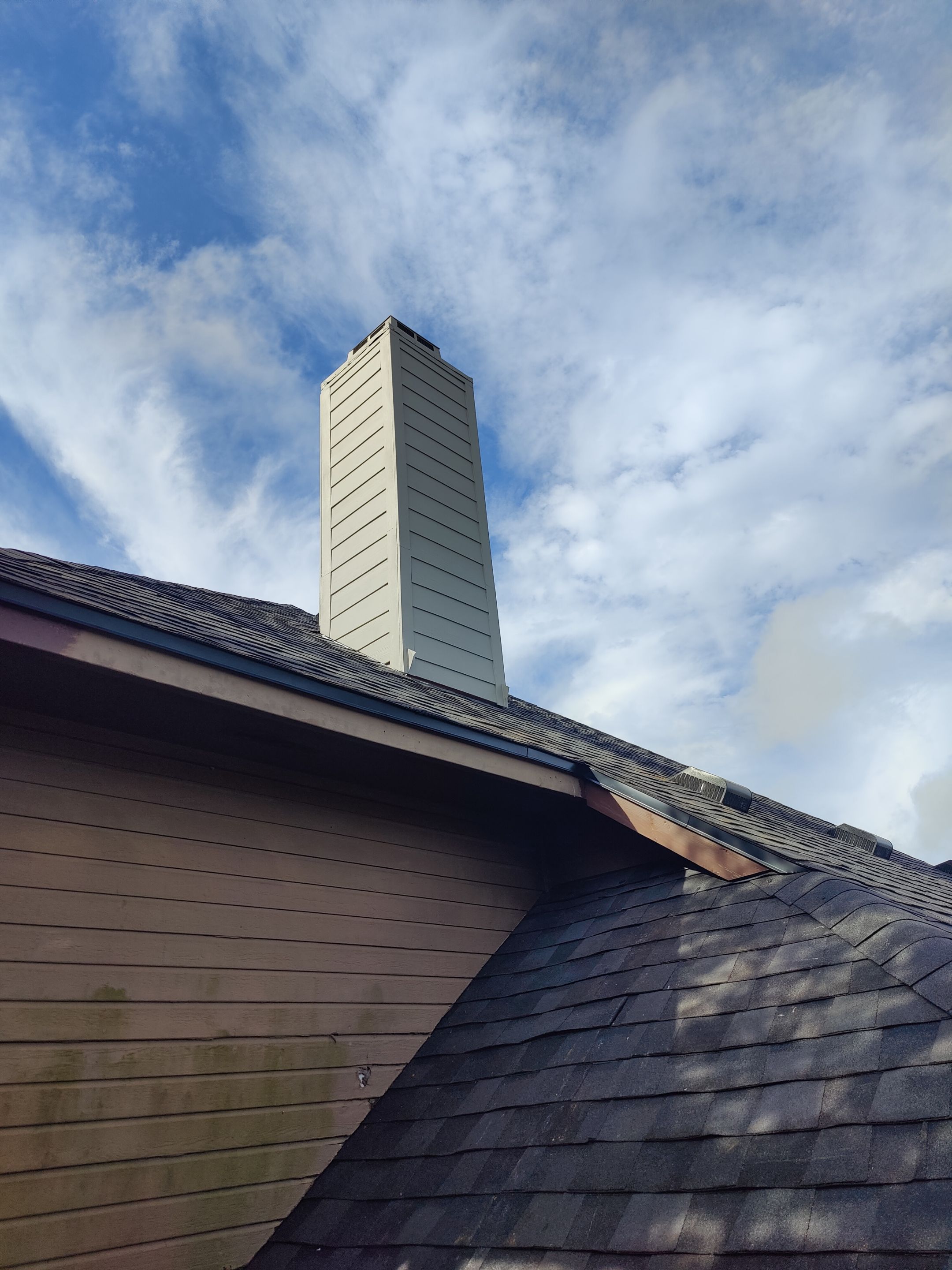 Residential Roofing Installation using Certainteed Landmark Moire Black by Galvan Roofing and Construction