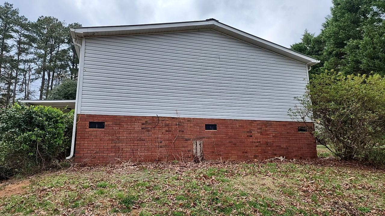 House Wash using cleaner by Power Wash Masters LLC
