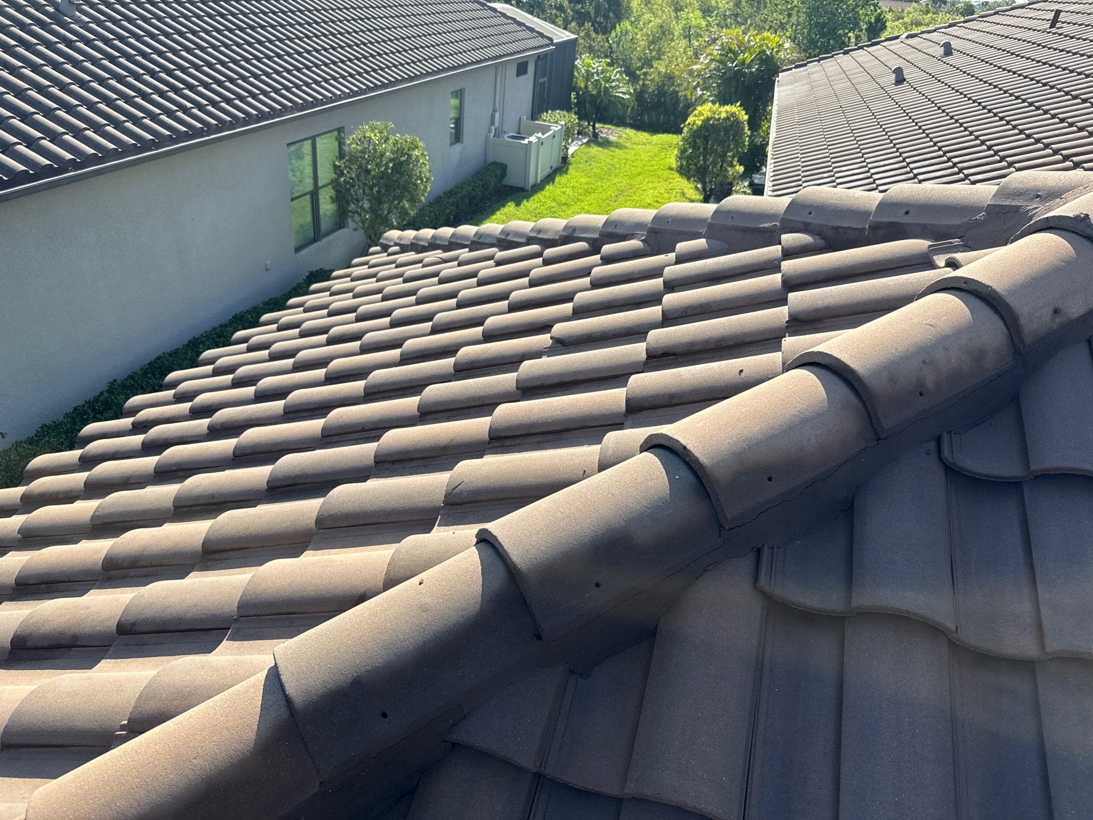 Concrete Tile Roof, Paver Driveway & Lanai Cleaning – Artisan Lakes Esplanade, Palmetto, FL by Sunshine AquaWash
