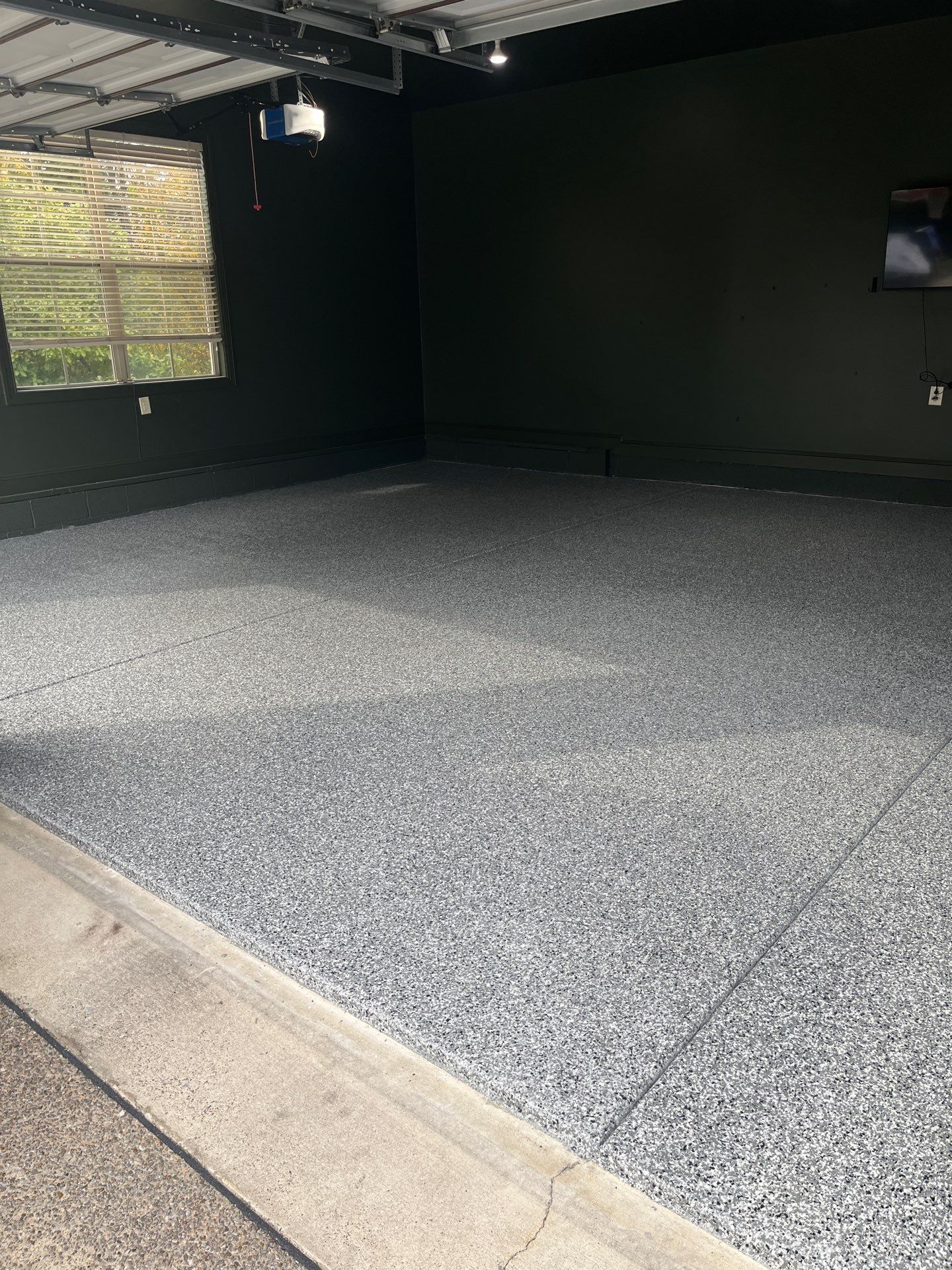 Garage Floor Coating using Wombat by My Garage Floor Guys
