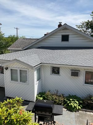 Shingle Roof Replacement and Seamless Gutter Installation in Lavelle