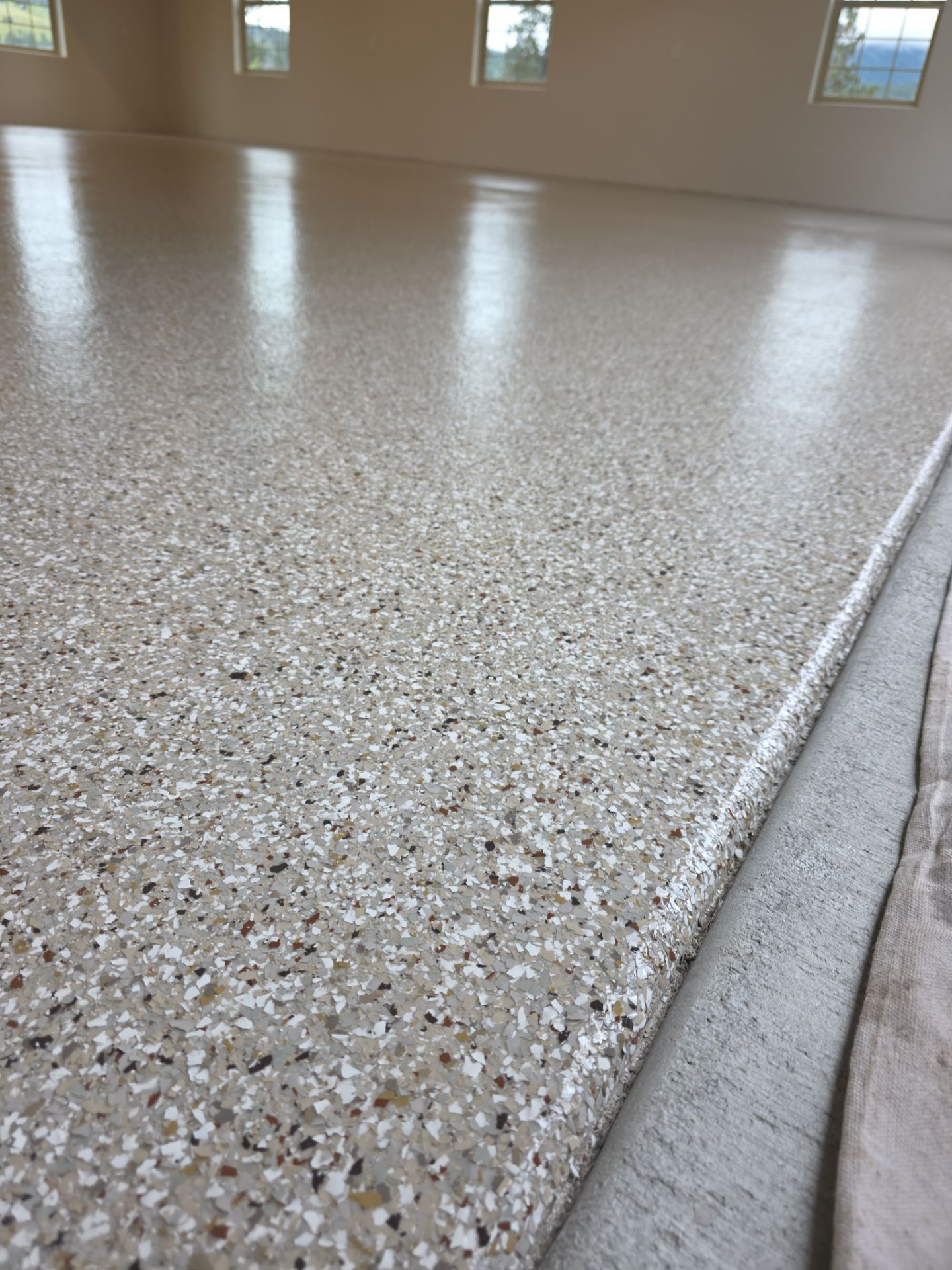 Pebble Beach Polyaspartic Garage Floor Coating in Liberty Lake by Croc Coatings, LLC