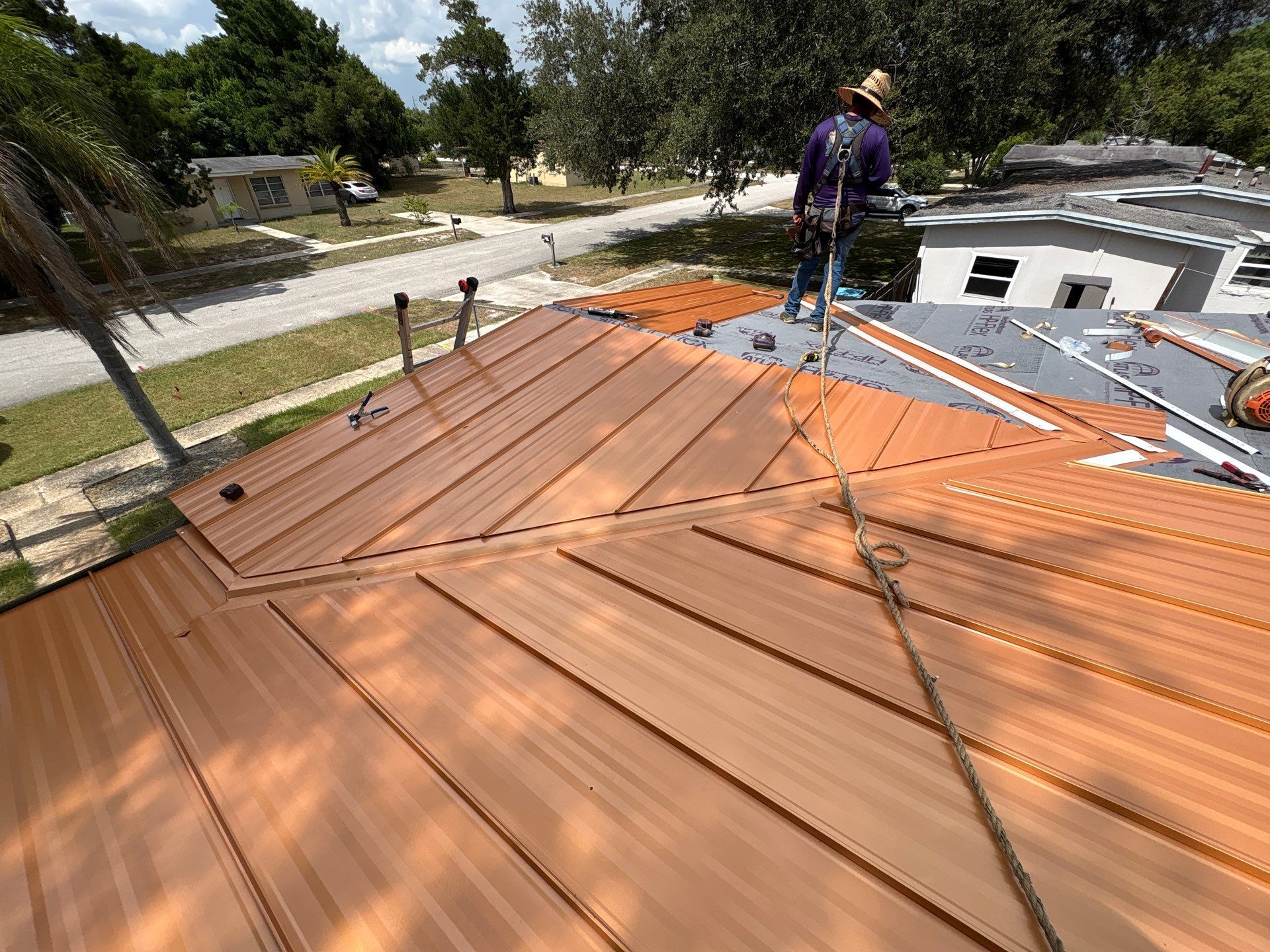 Standing Seam Metallic Copper Metal Roof Replacement in Deltona by Pinnacle Roofing Group