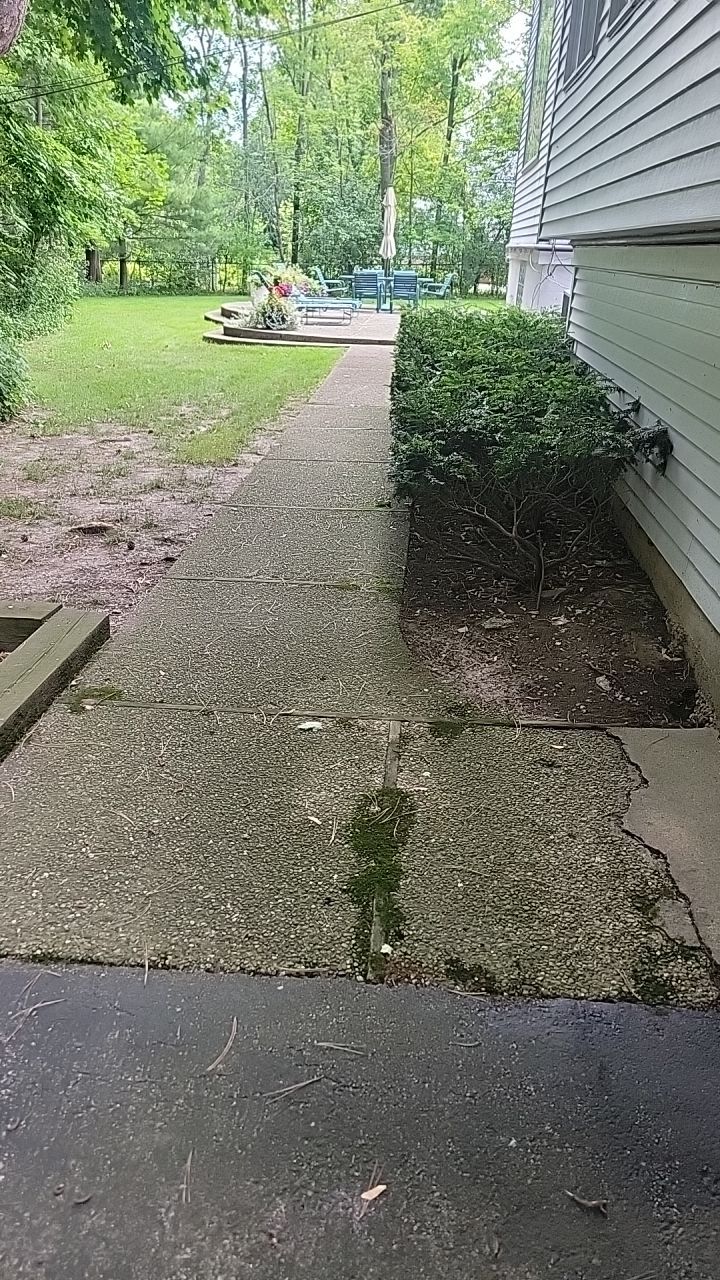 Housewashing  using Algaecide, soft wash soap by Northern Power Washing LLC.