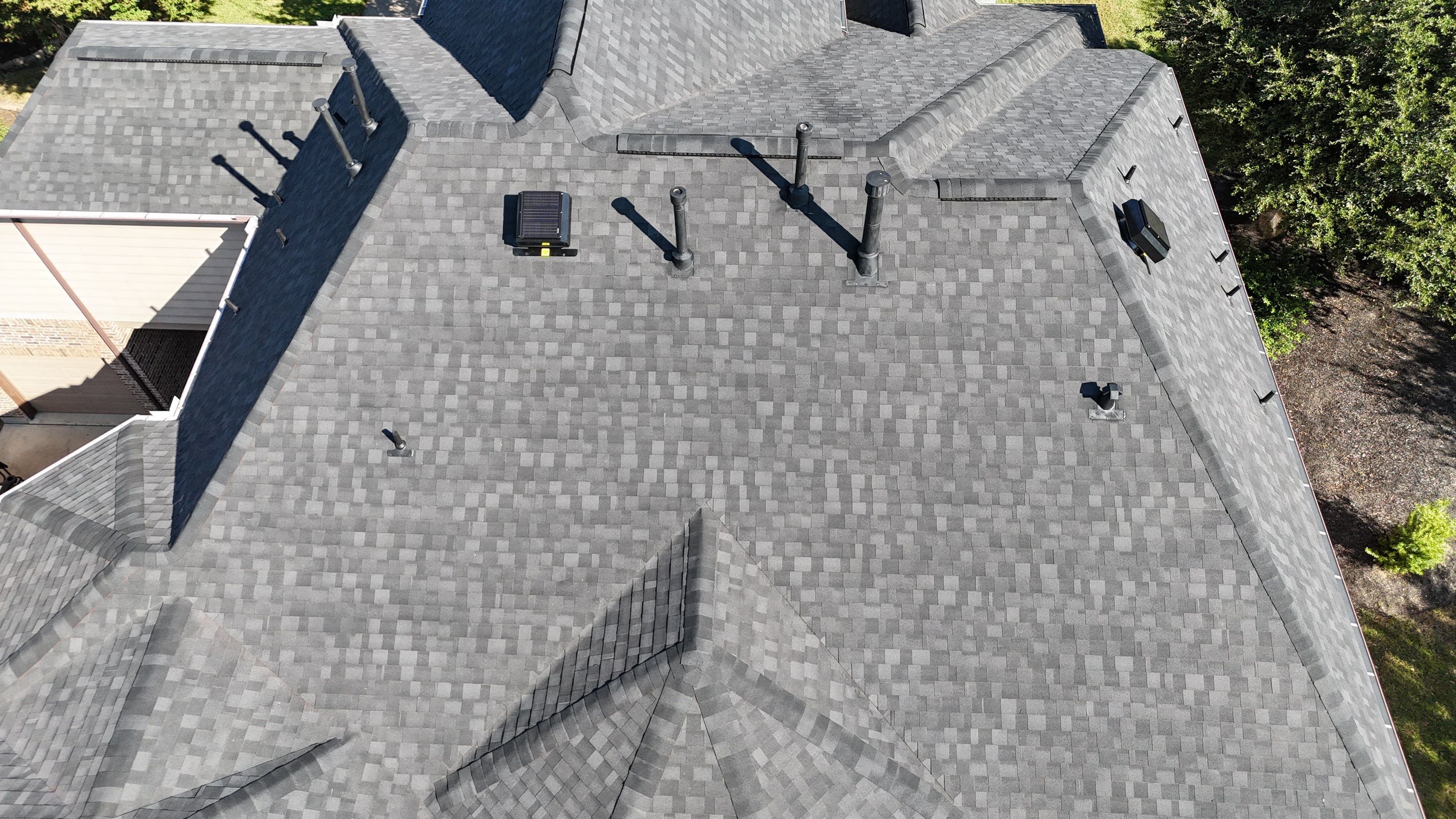 Residential Roofing Installation using IKO Dynasty by Core Four Roofing