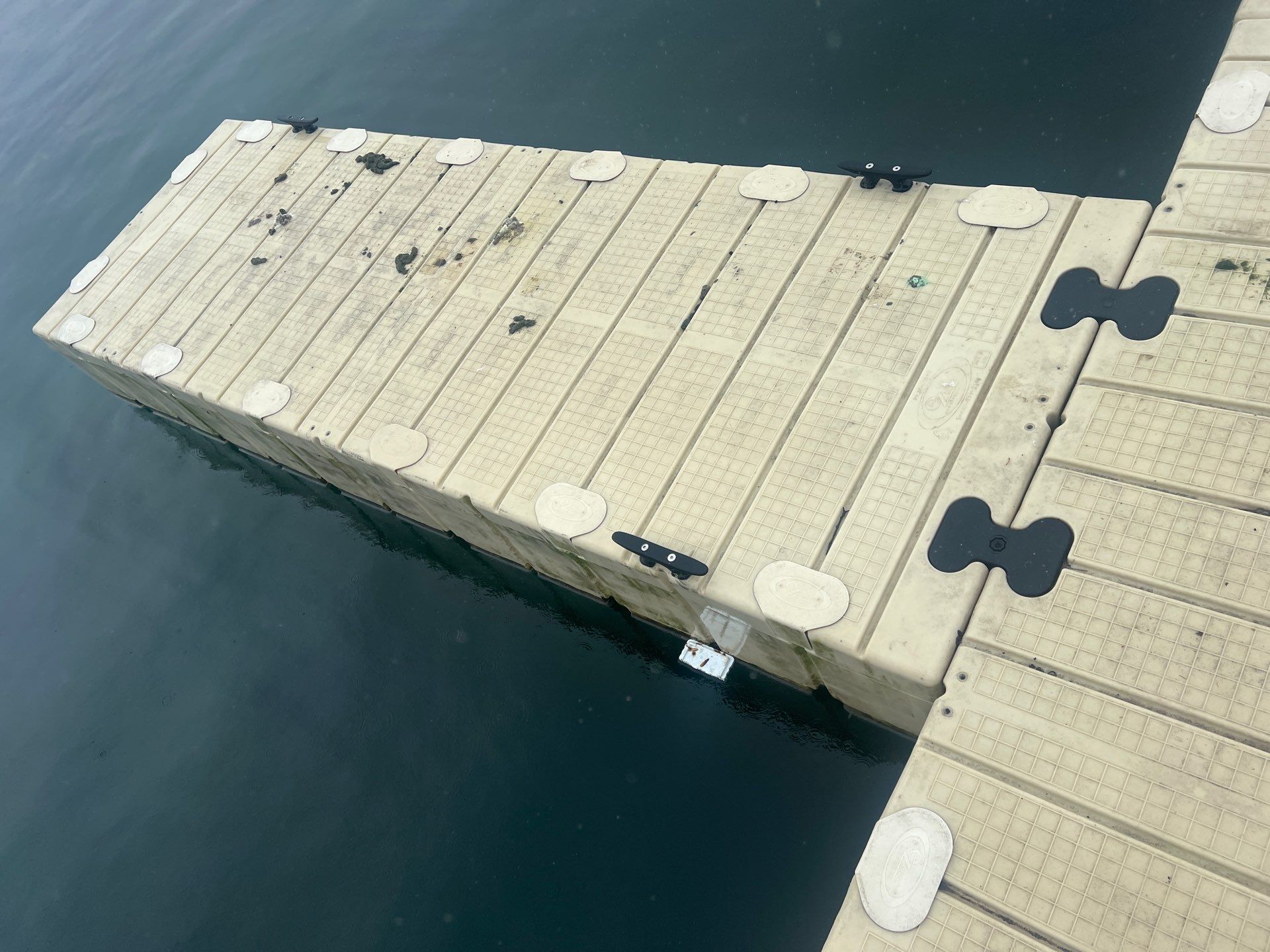 Power washing of floating dock by Northern Power Washing LLC.
