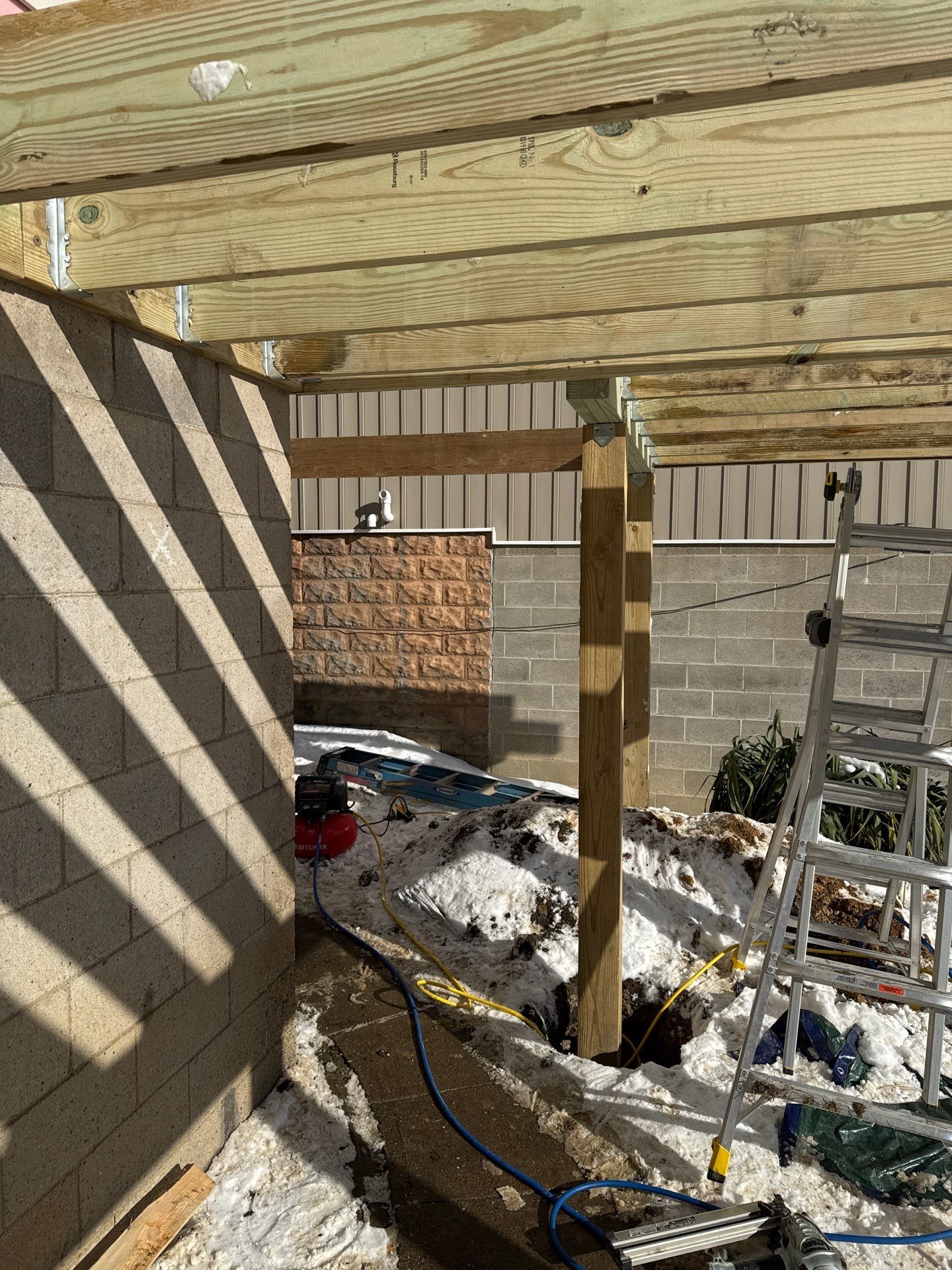 Deck and door by Cousins Roofing Siding & Decks