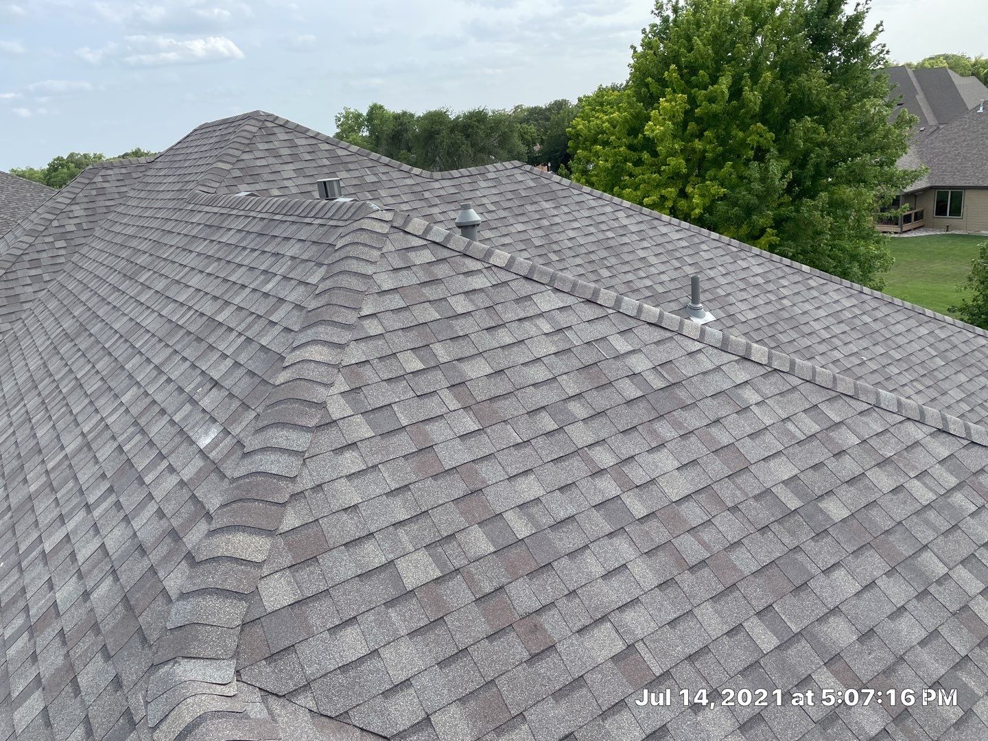 Storm Damaged Roof Replacement by Eaton Roofing 