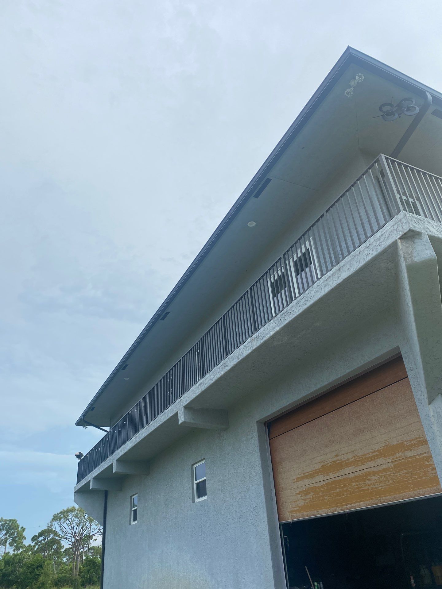 Black Seamless Gutters St. James City by Gutter Professors