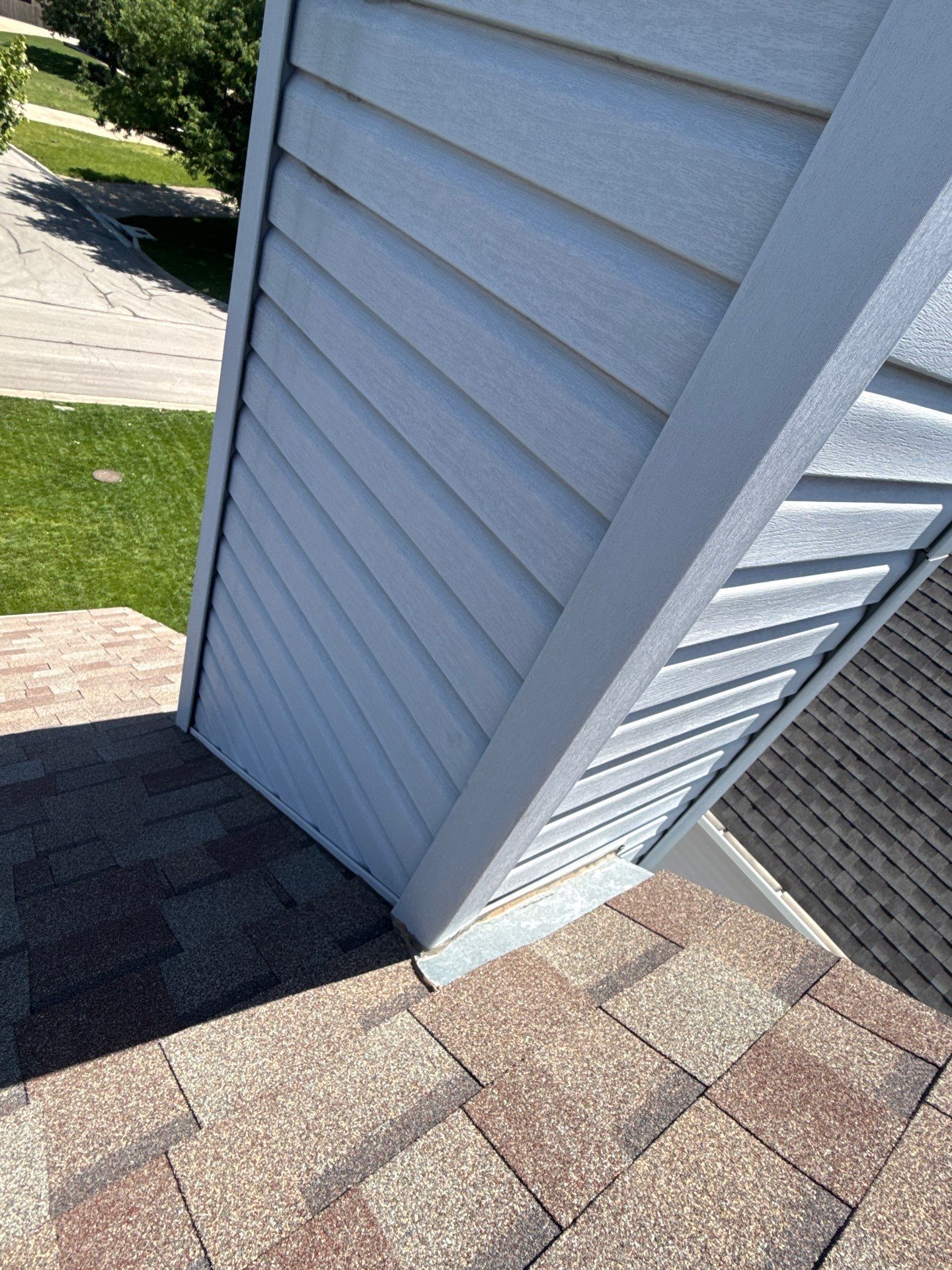 Vinyl Siding and Chimney Flashing Repair in Shawnee by Summit Roofing