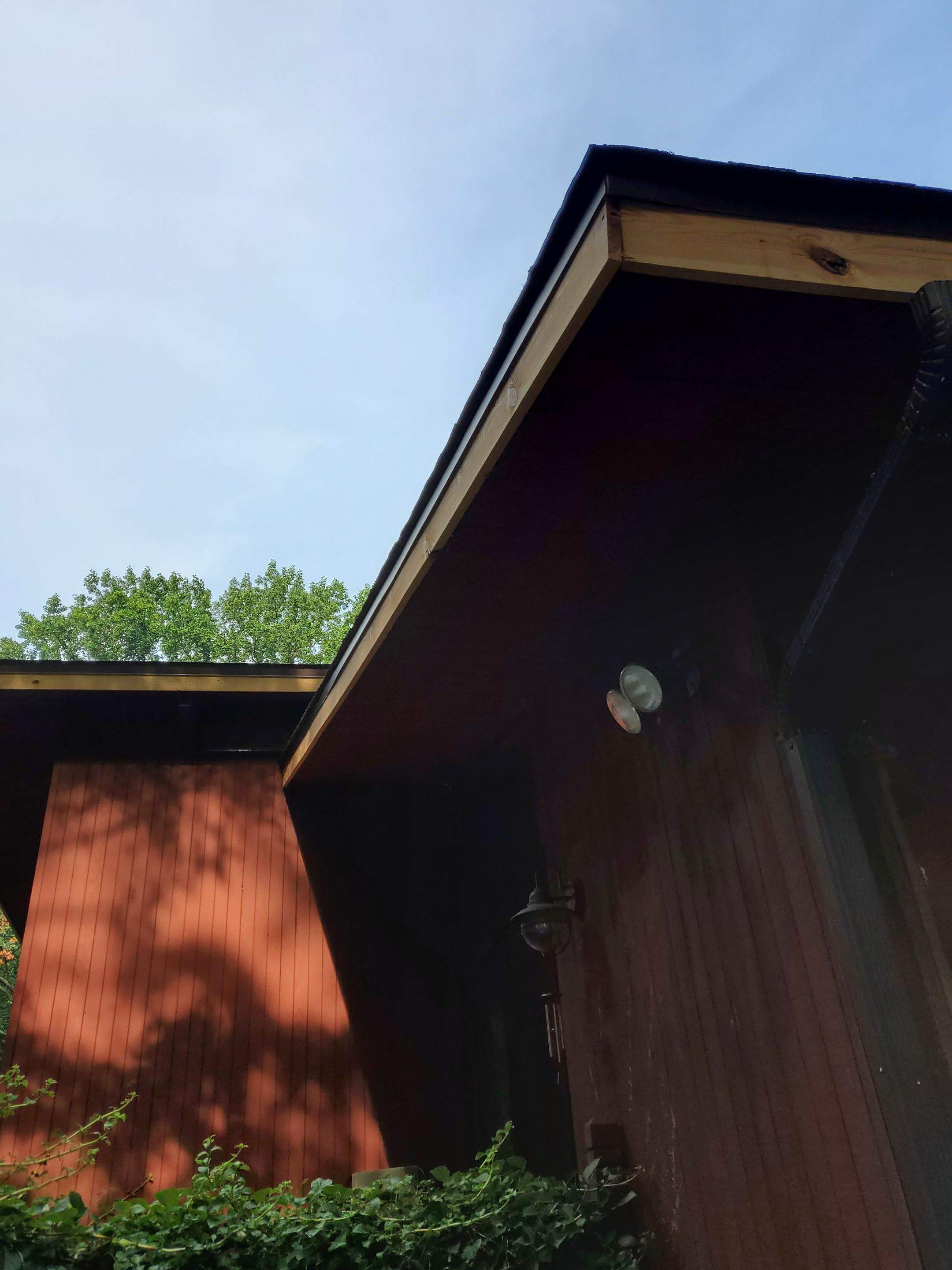 Deckhouse Roof Replacement by American Home Contractors