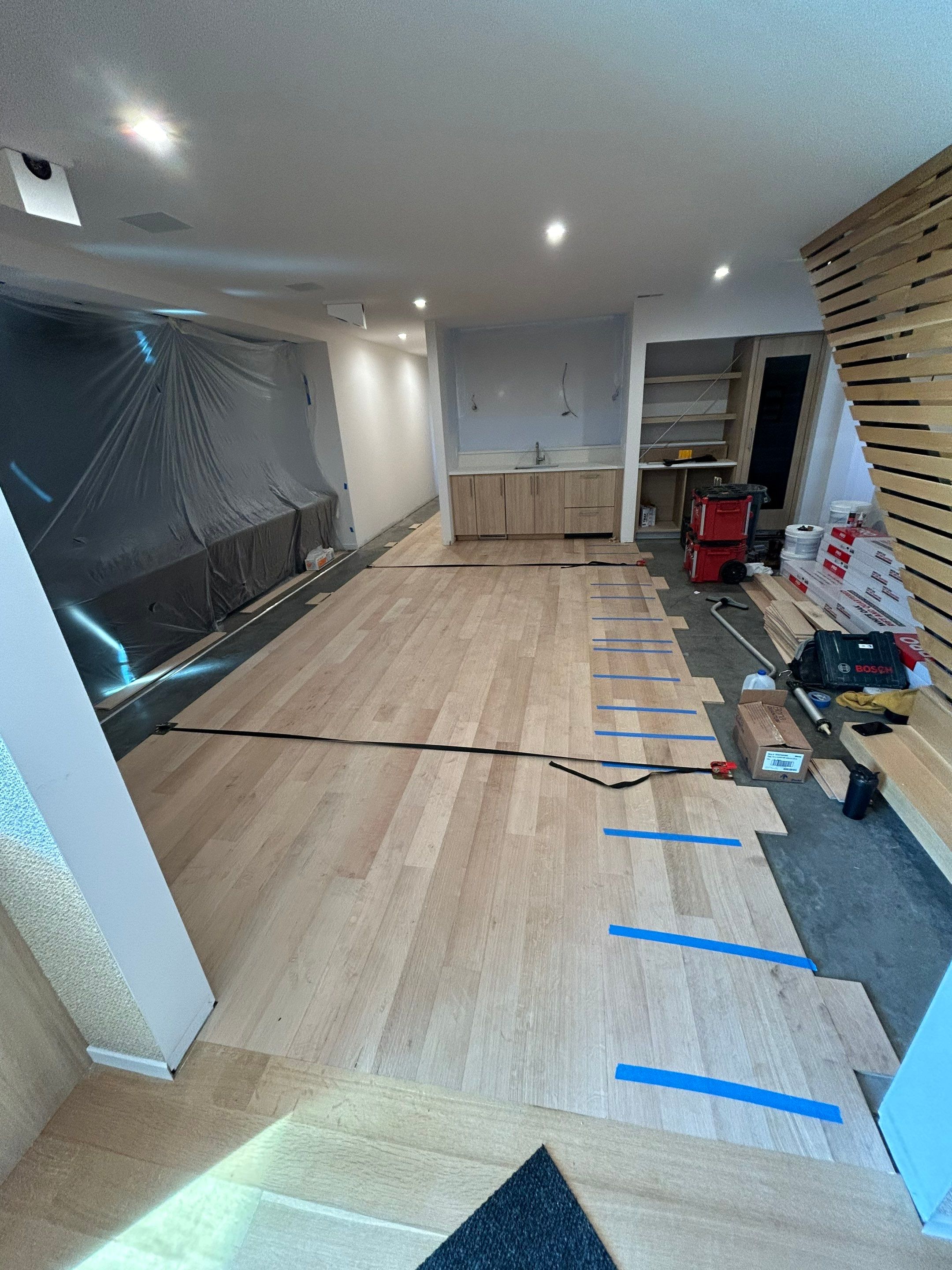 Basement Remodel using Engineered White Oak by RTBaldwin Hardwood Floors