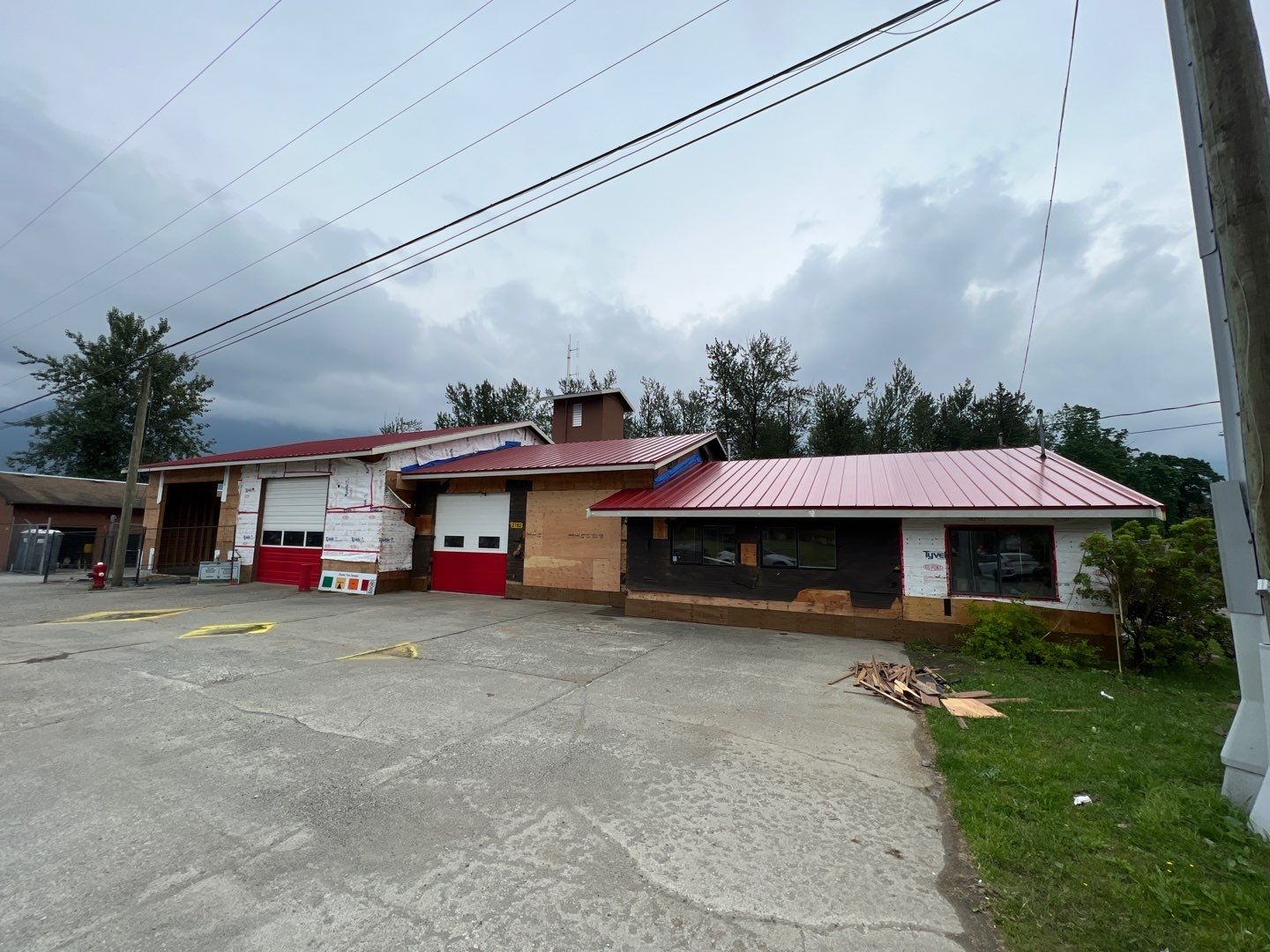 Commercial Roofing Installation using 12" Prolok metal by Top Notch Roofing Inc