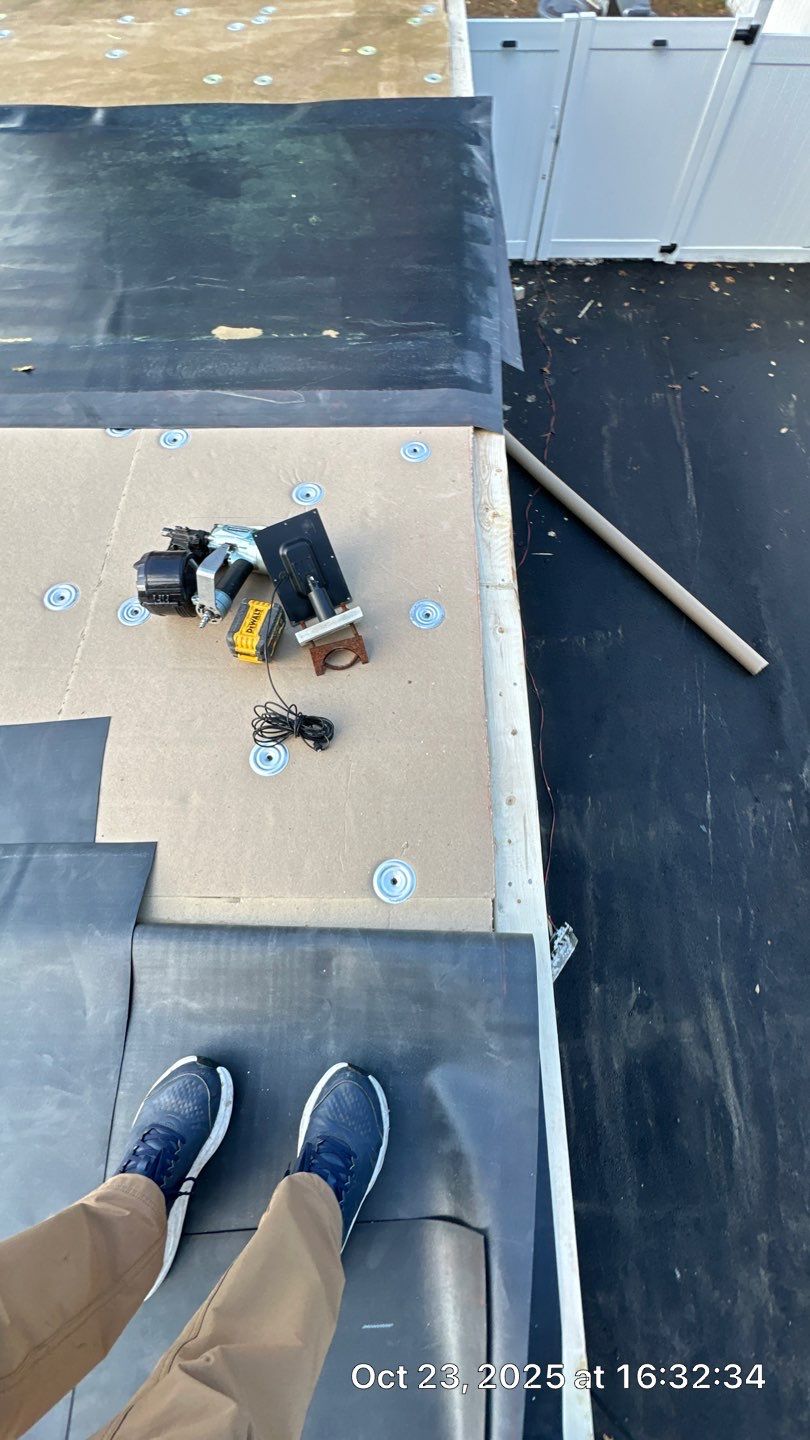 Westford EPDM Flat Roof with Gutter & Soffit/Fascia Replacement by Mighty Dog Roofing of Greater Middlesex County