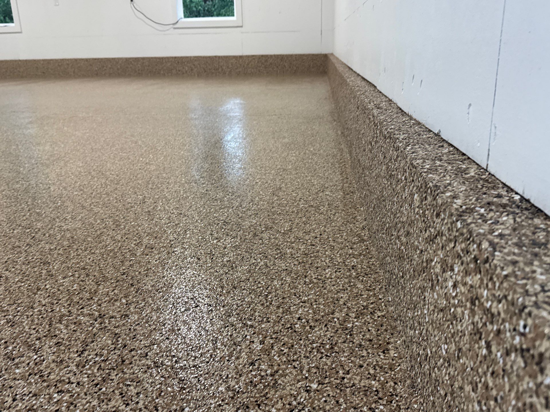 Garage in Gainesville, FL in Sandstone by Cross Creek Concrete Coatings