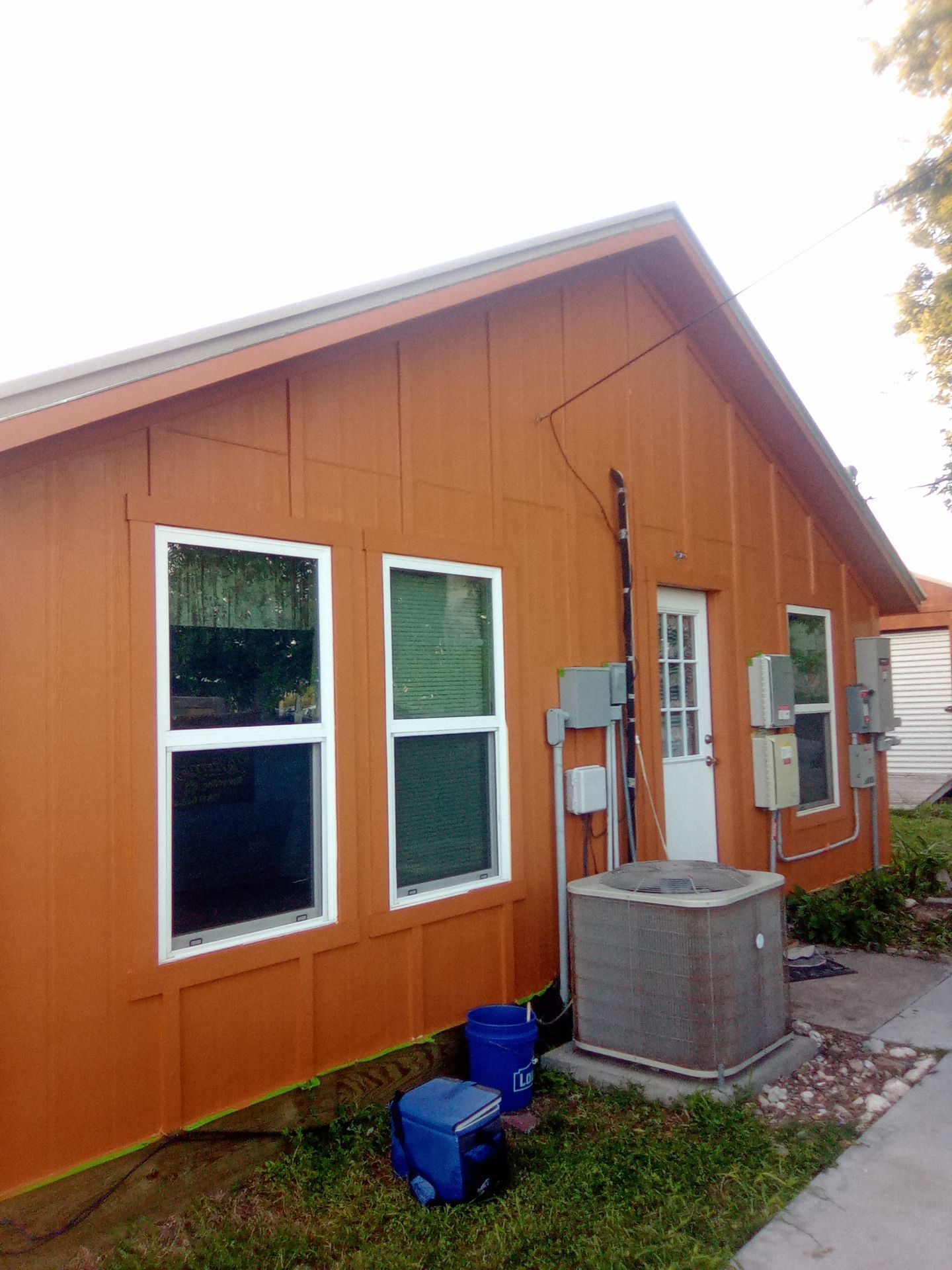 Vinyl to Hardie by Bayfront Roofing and Construction