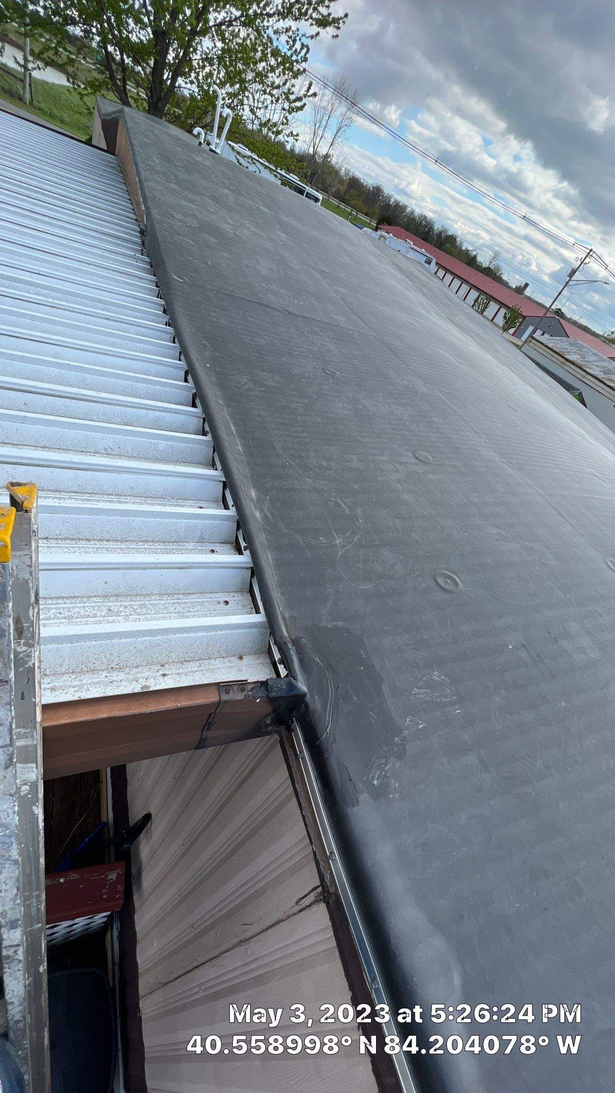 Residential Roofing Installation using 60 mil rubber roof  by Nitro Roofing and Construction