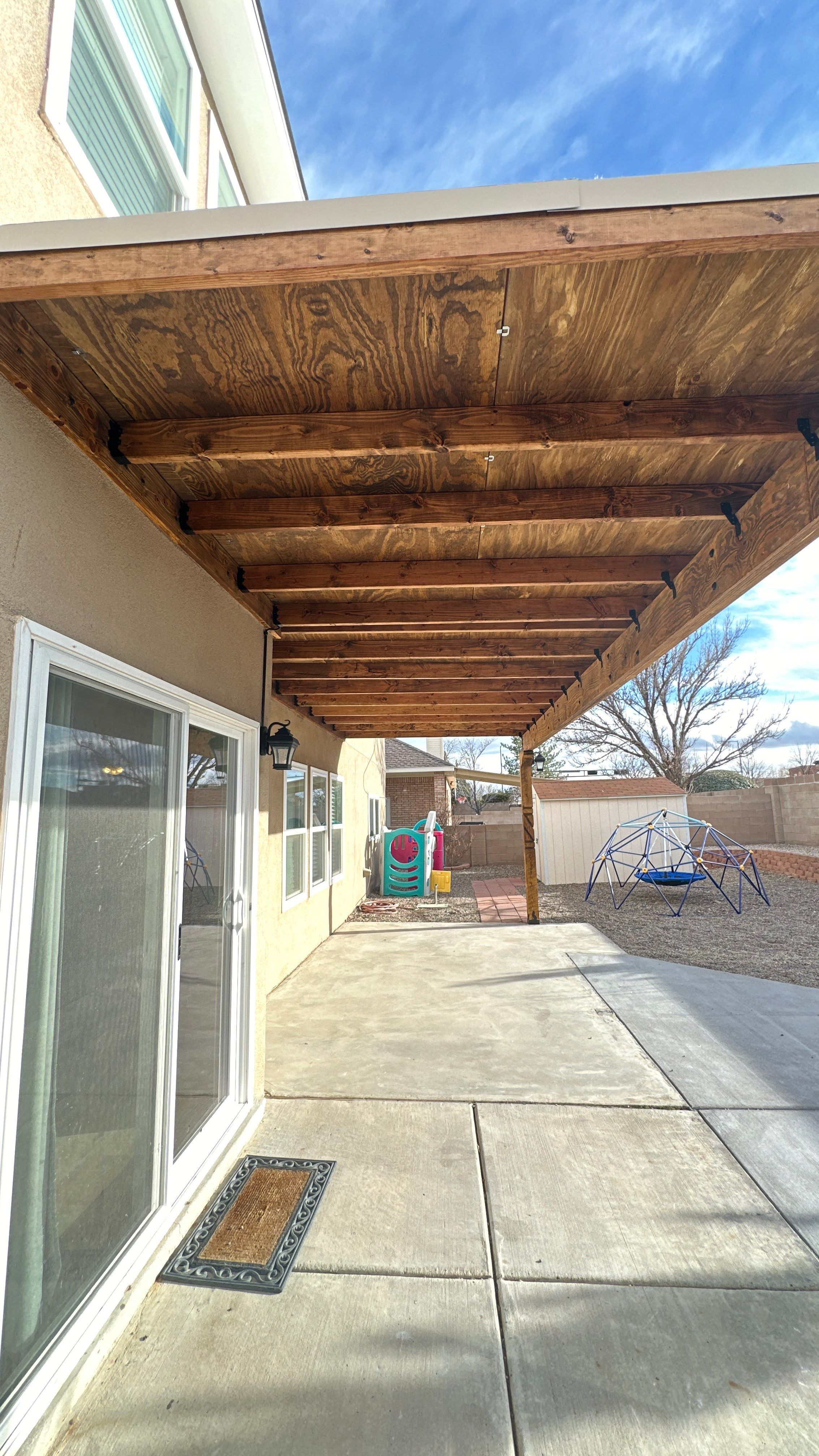 Patio Cover using Carved Douglas Fur by Rio Grande Building & Storage