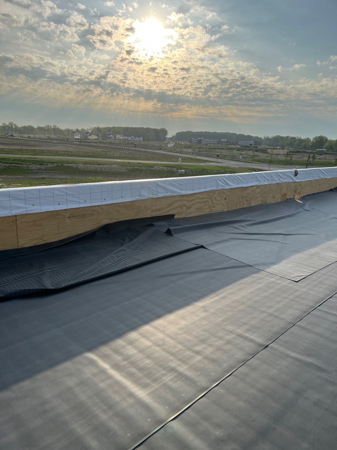 Commercial Roofing Installation using 60 mil rubber roof  by Nitro Roofing and Construction