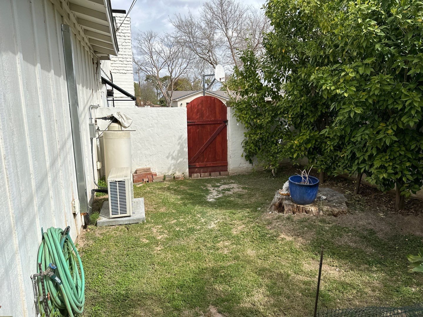 Wagon Wheel - A Stunning Home Exterior Makeover with Dunn Edwards Paints in Phoenix, AZ by Double G Painting Contractors, LLC