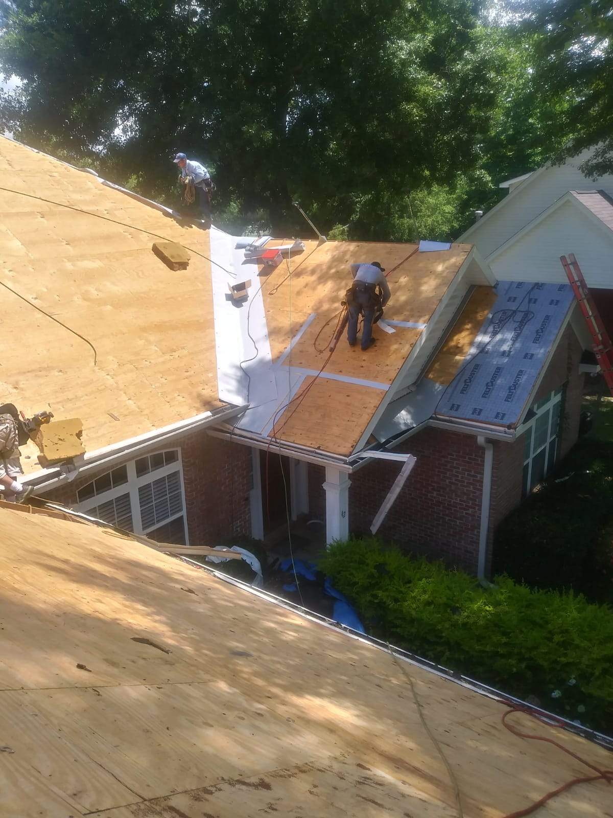 Residential Roofing Installation using Roof Replacement by American Roofing & Construction LLC