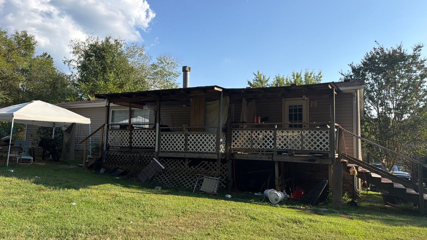 Vinyl Siding and Custom Deck Installation for Lyles Residential Property by Stellar Roofing & Restorations