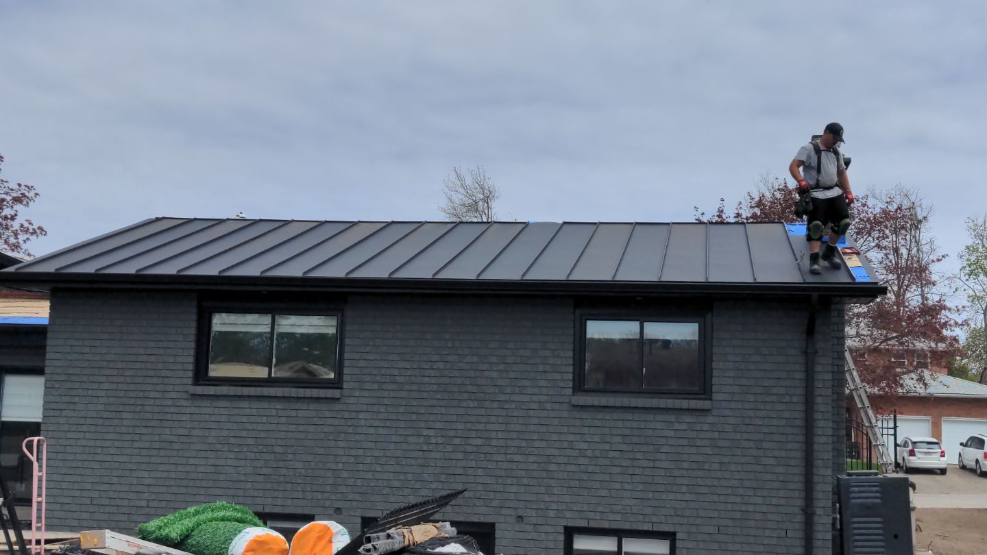 Residential Roofing Installation using 16" Standing Seam Panels by Jay Carter Roofing & Sheet Metal