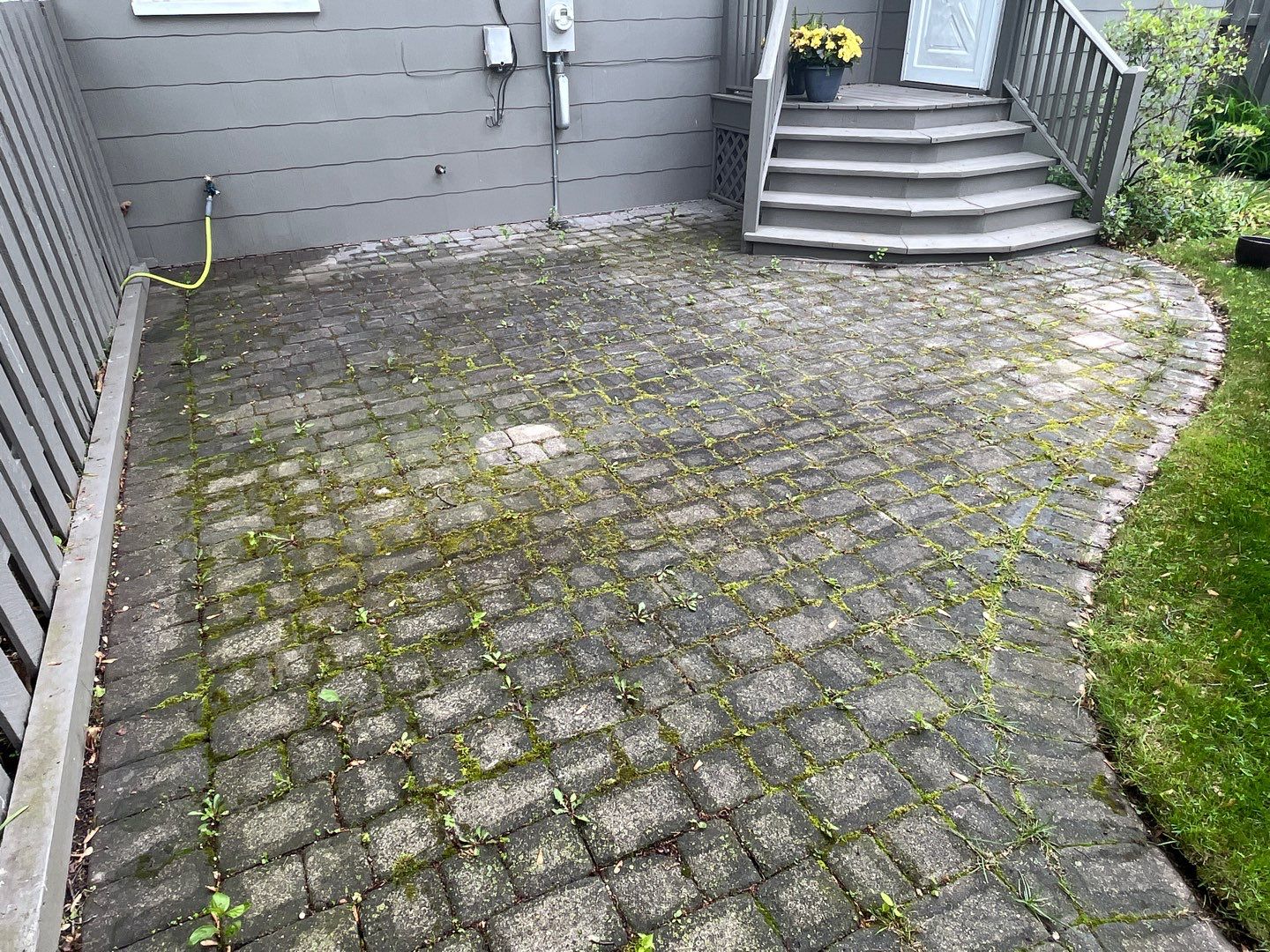 Brick paver cleaning and sealing by Northern Power Washing LLC.