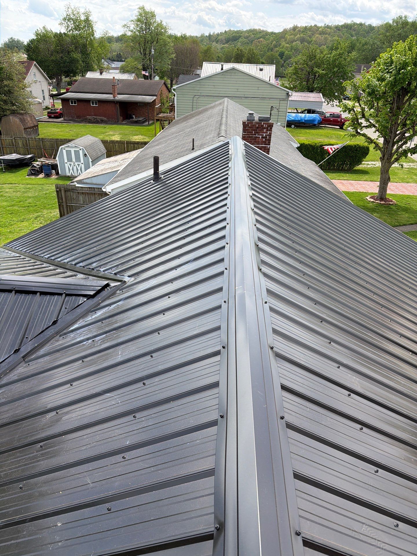 Residential Roofing Installation using Metal by Rainstoppers Roofing
