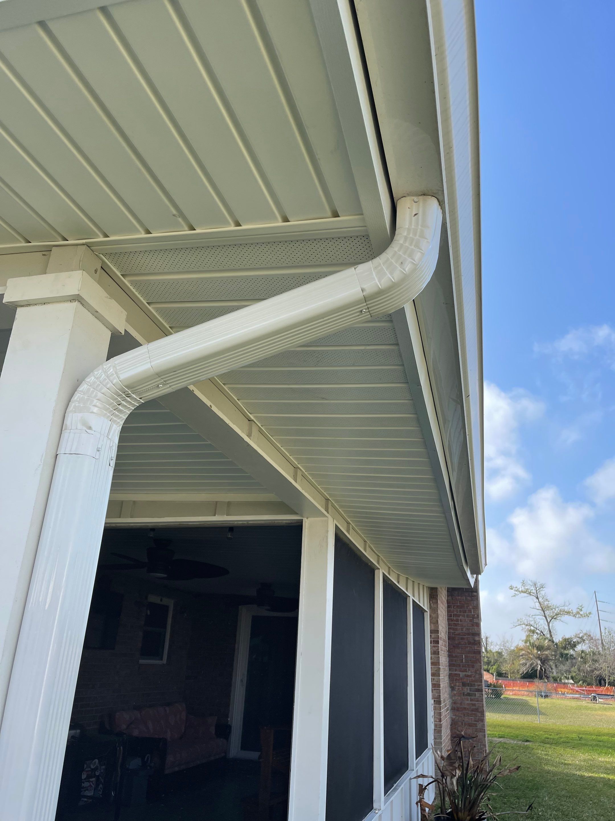 Soffit and Fascia Installation Using White Vinyl Soffit by Gutter Professors