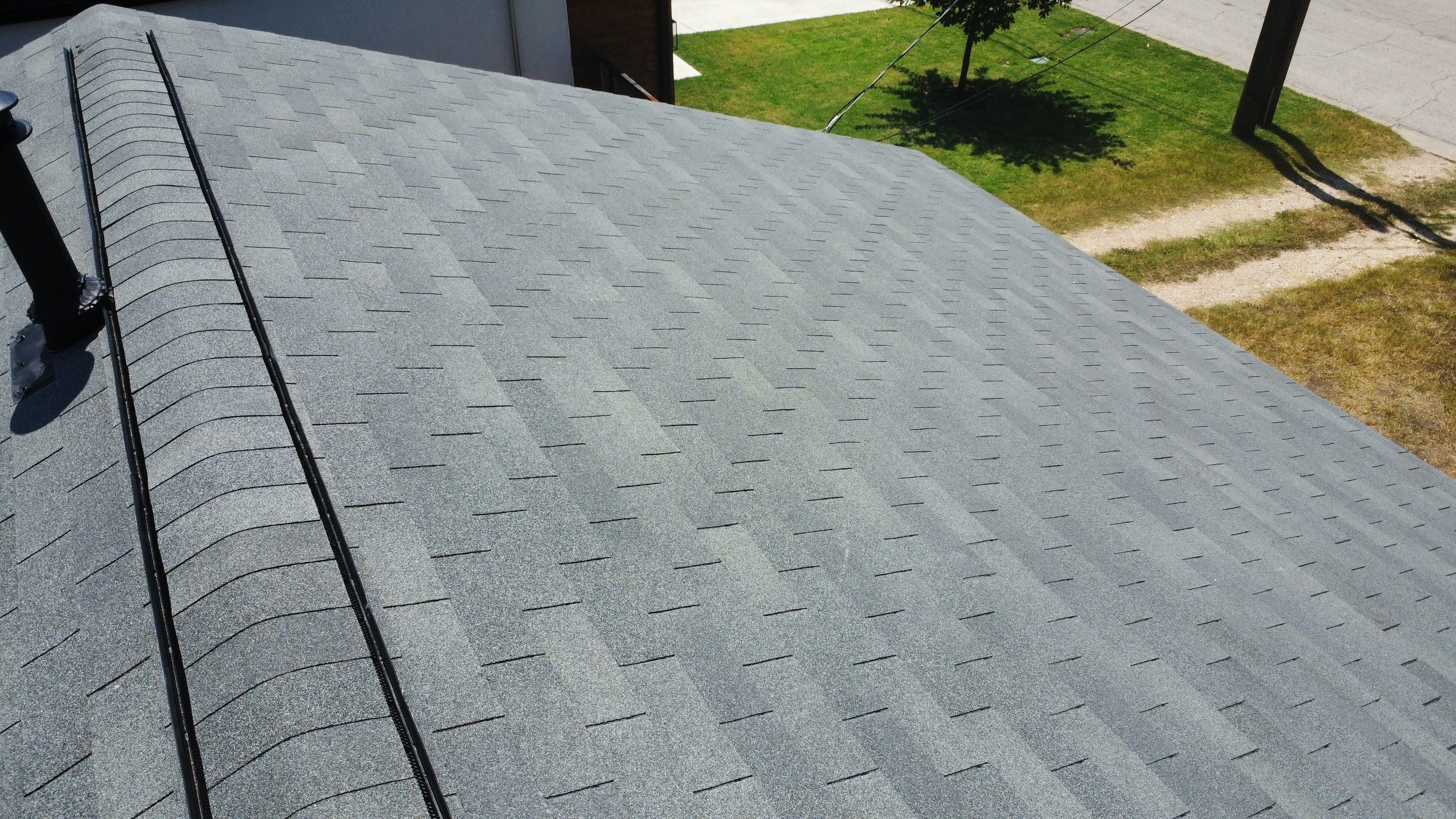 Full Roof Replacement – Main Home + Guest House | Estate Gray Shingles | Austin, TX by Kstylez Roofing & Construction