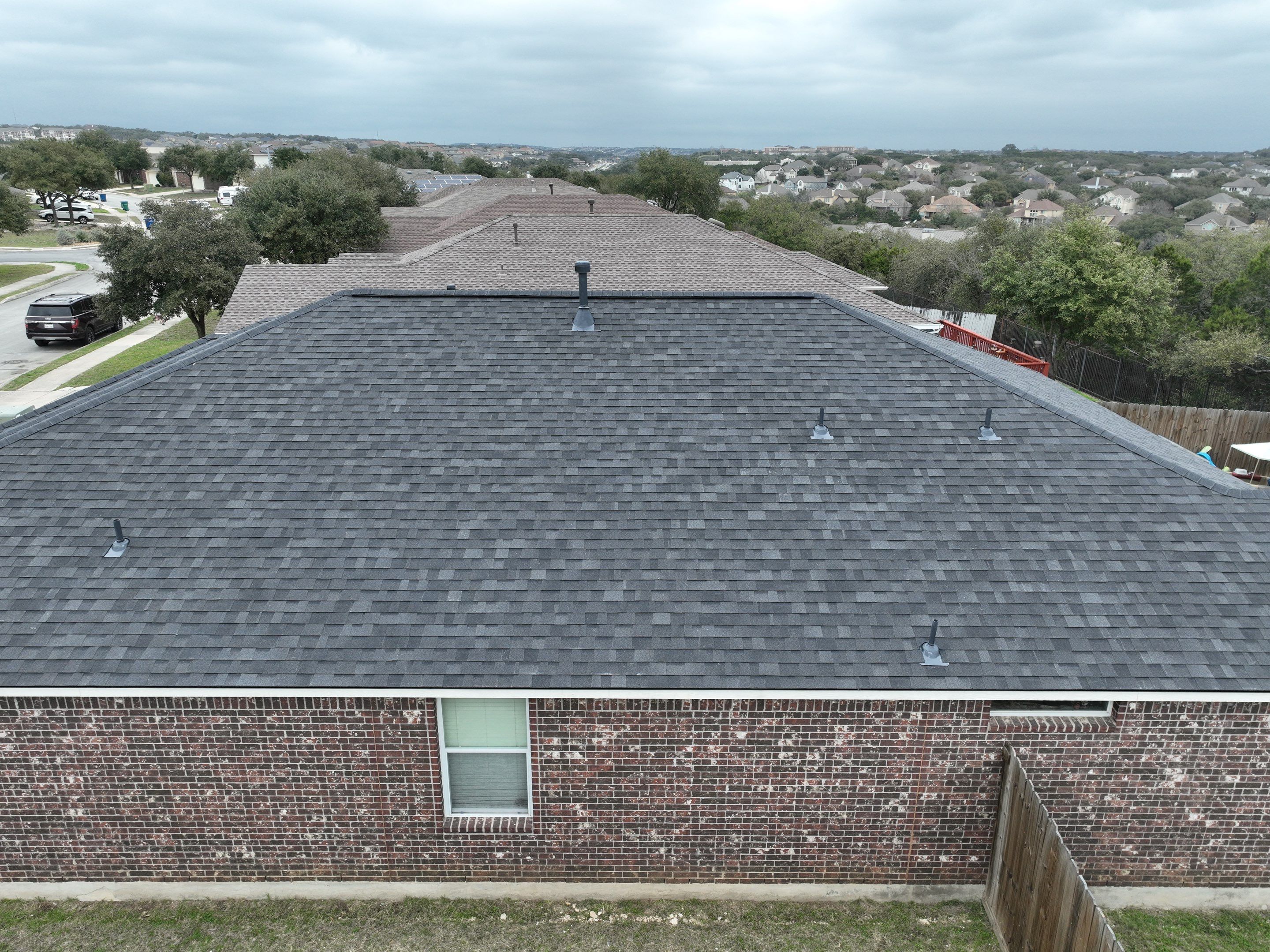 Residential Roof Replacement using 30 Year Laminate Shingles with High Profile Ridge by Premier Roofing and Contracting