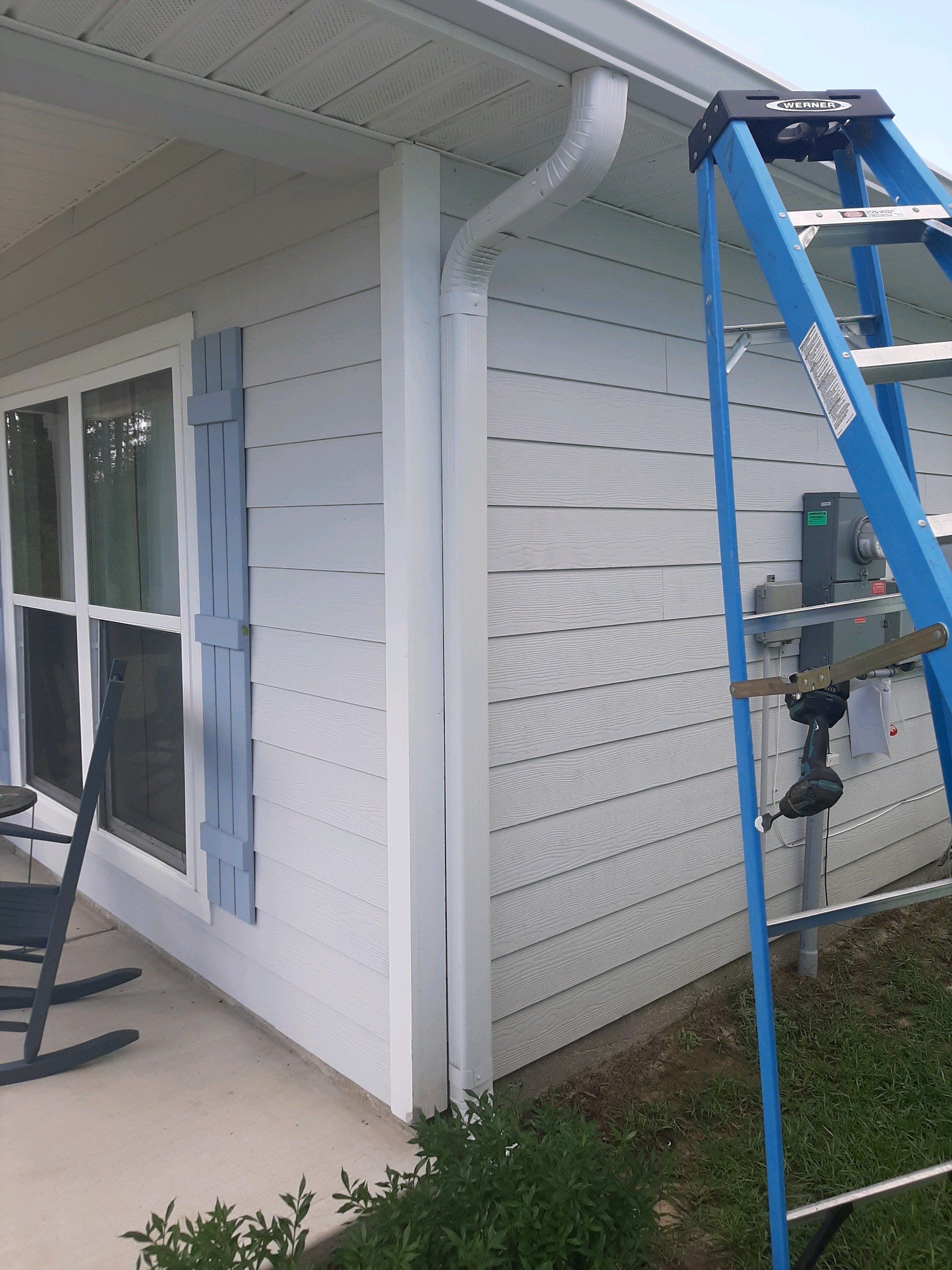 Seamless Gutter Installation using White by Gutter Professors