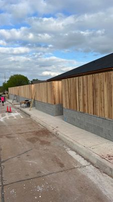 Cedar Fence using Cedar Pickets and Metal Poles