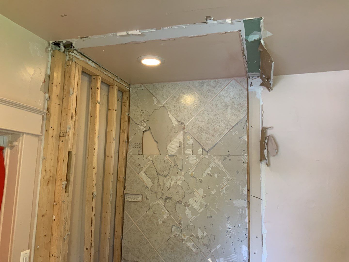 Bathroom Remodel using New Bathroom Tile and Tube by Alpha Design Services