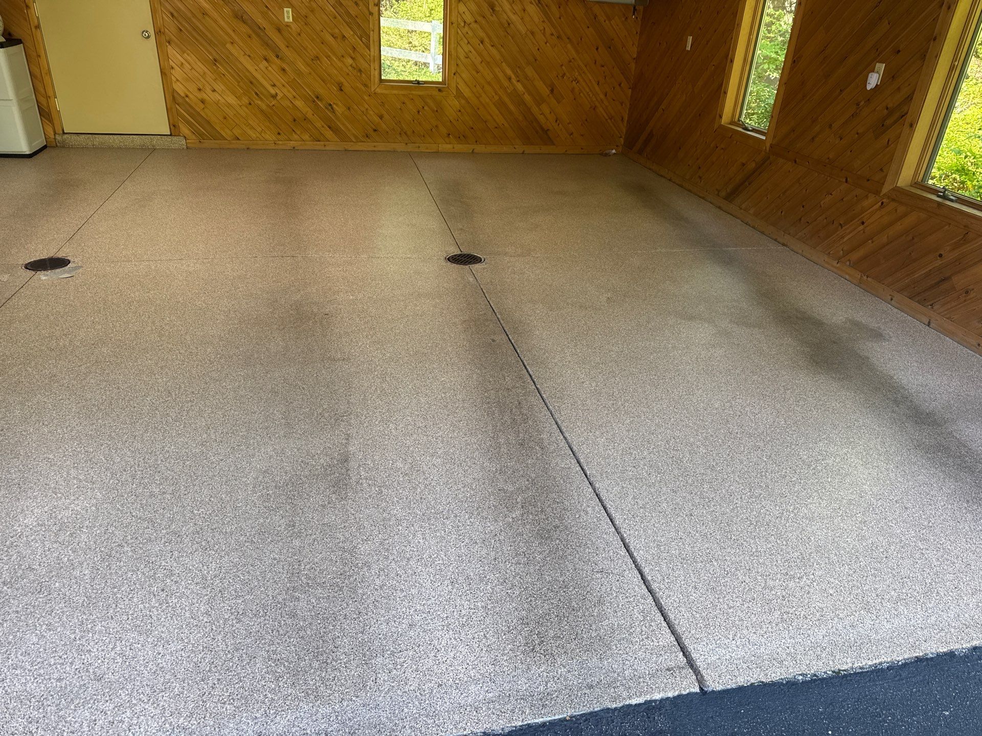 Grand Haven Garage Epoxy Floor Coating with Wax Wing Flake by Gordon Painting