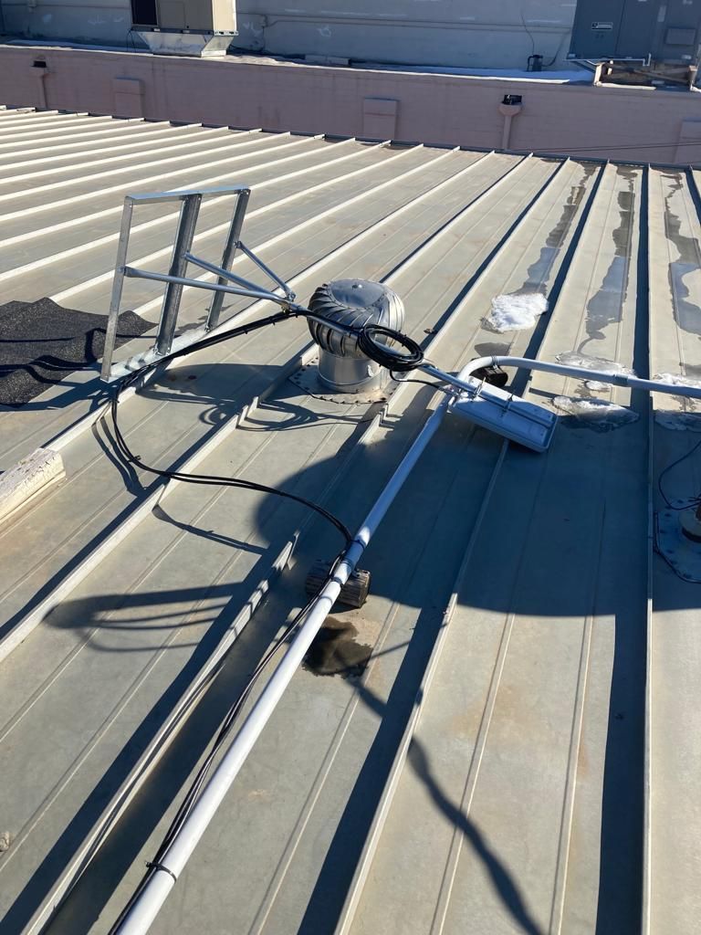 Roof Repair on a metal roof  by Grell Roofing, LLC