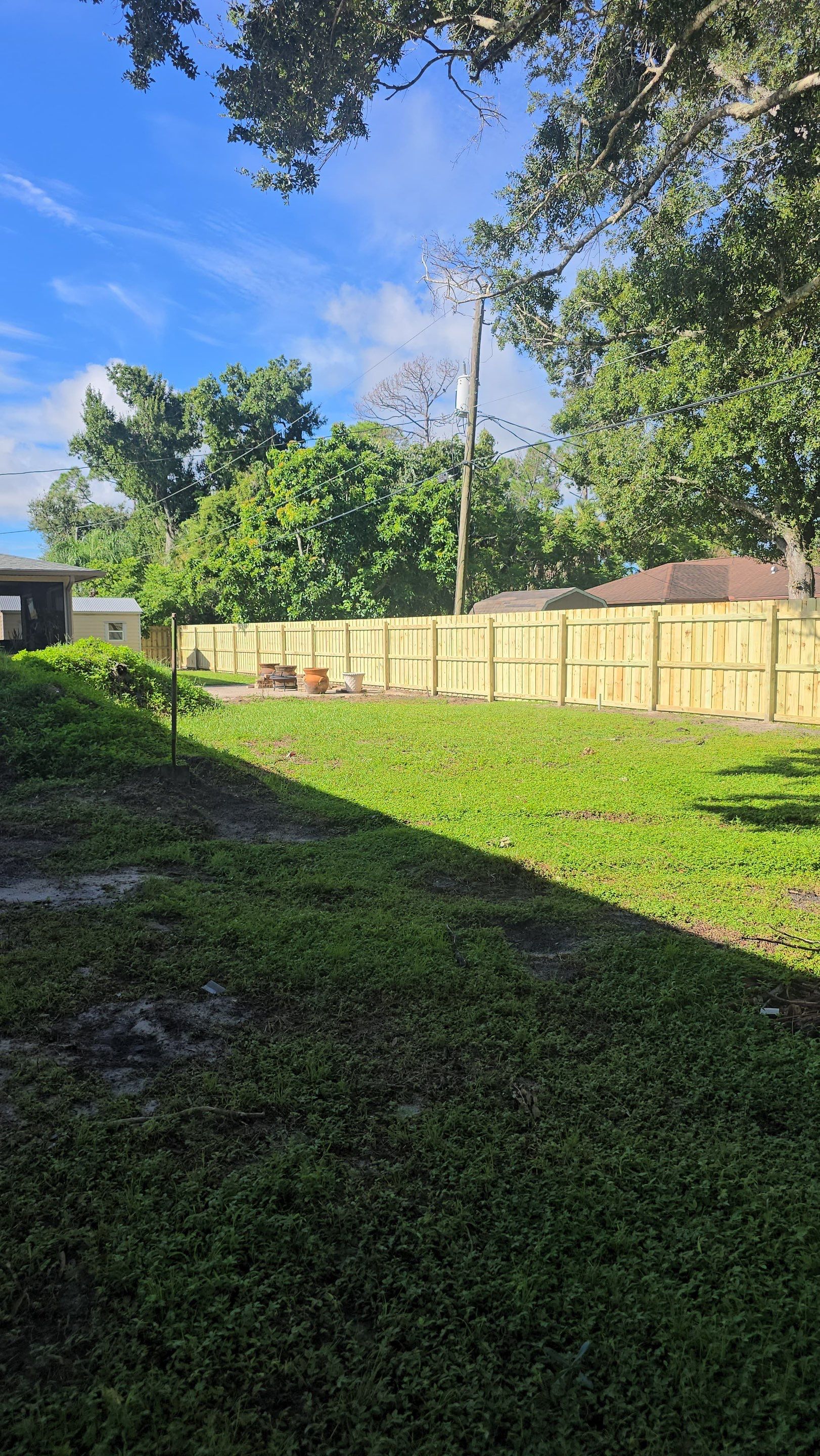 Pressure-Treated Wood Privacy Fence and Gate Installation in North Port by True Fence LLC